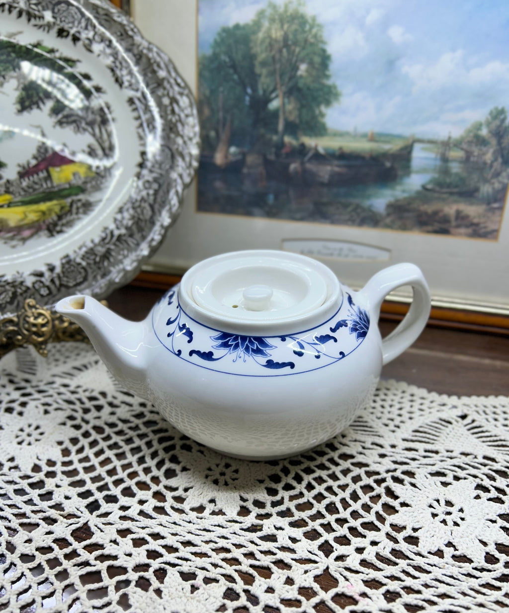 Classic white teapot by the cameo China Blue Lotus collection.