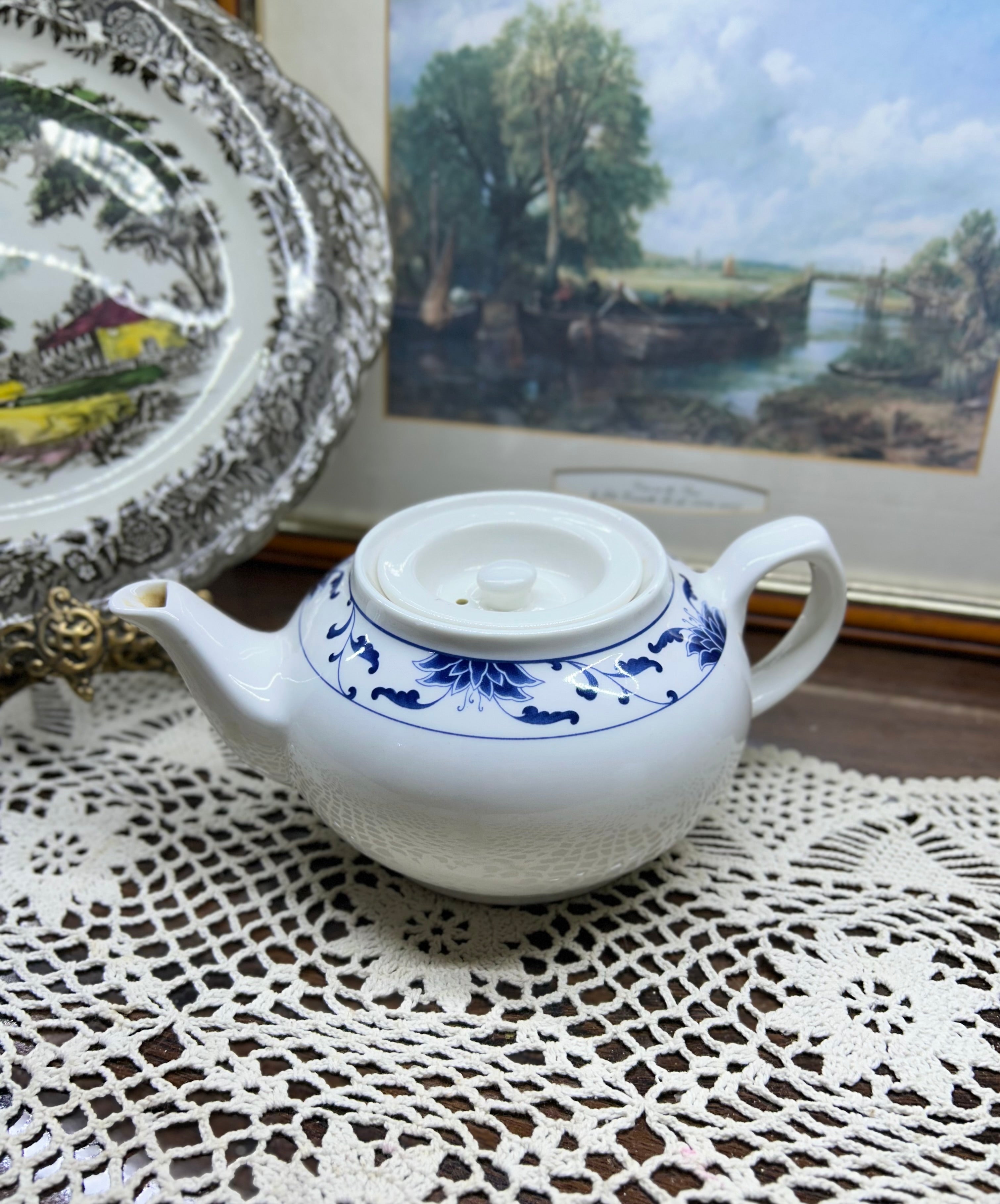 Classic white teapot by the cameo China Blue Lotus collection.