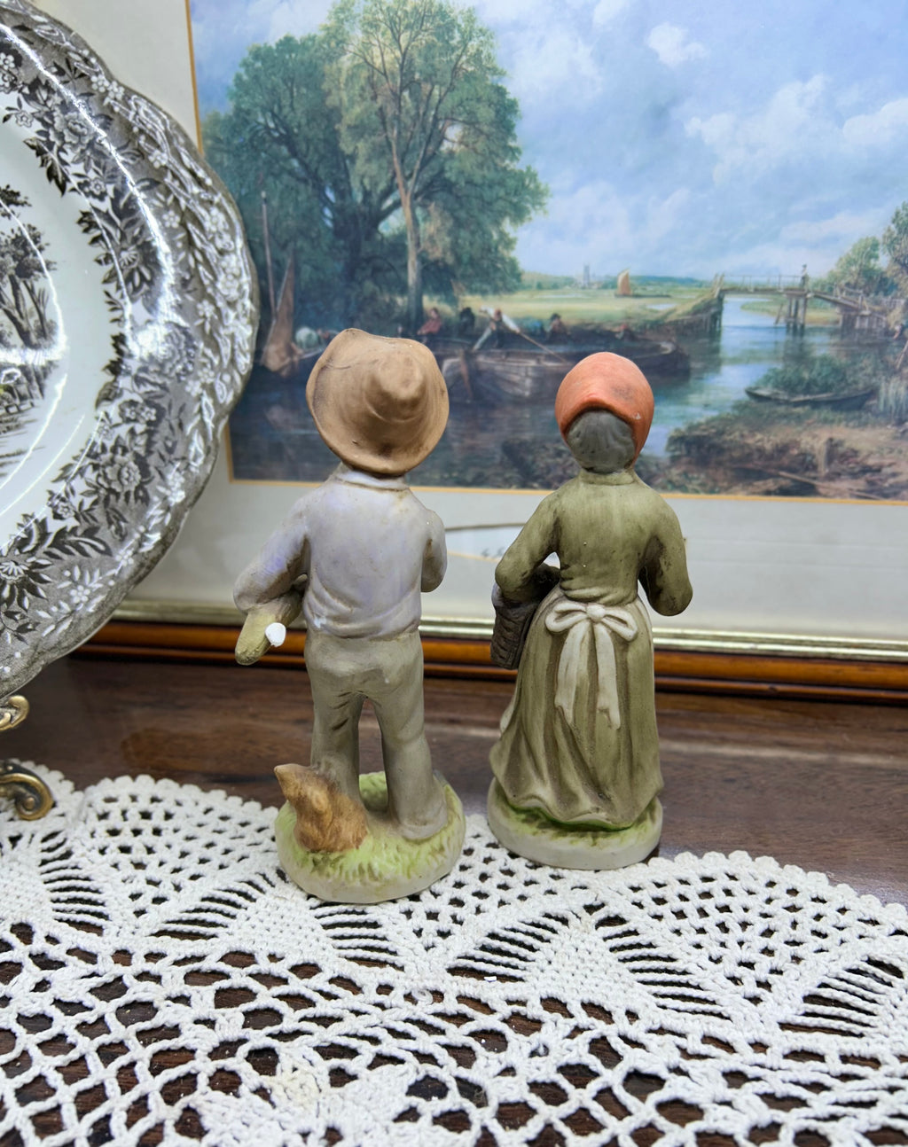Vintage ARDCO ceramic figurines depict an elderly couple