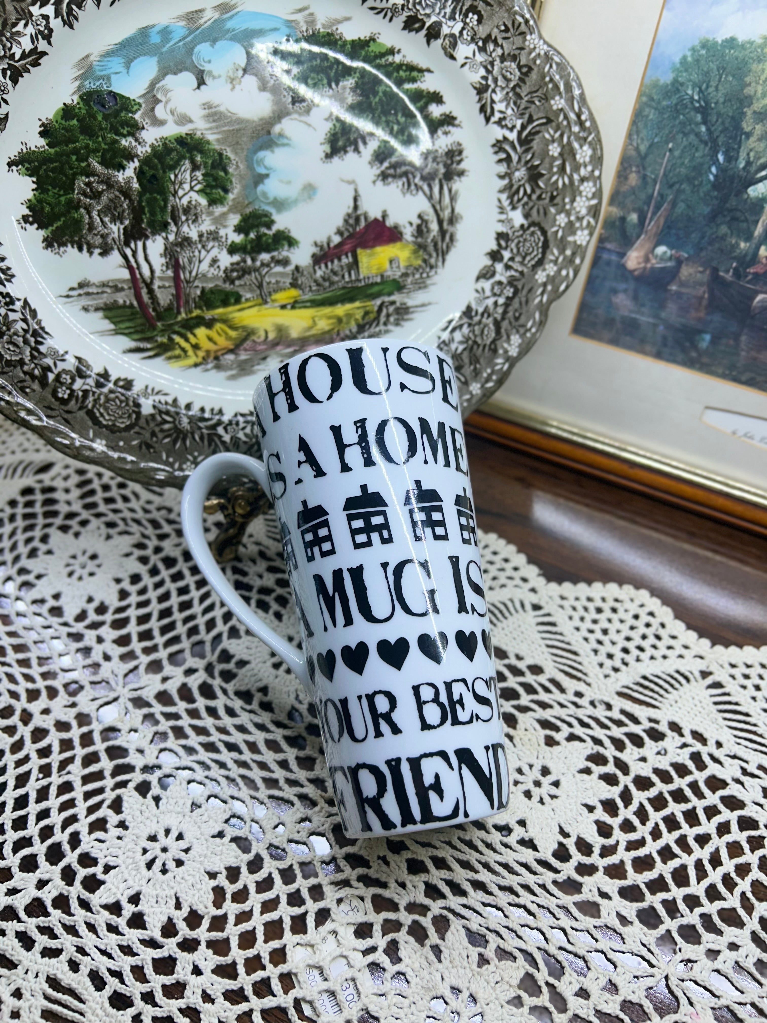 Tall ceramic handled mug