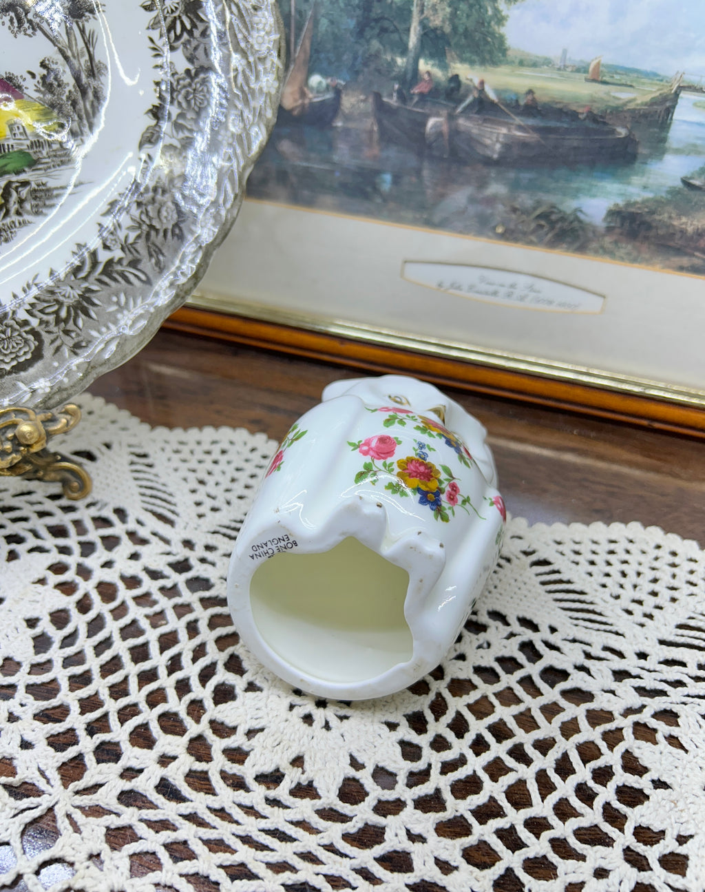 Crown Staffordshire owl ornament features a "Cottage Garden" floral pattern and gold accents — England