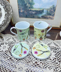 Leonardo collection “ come into the garden” lidded mugs — fine porcelain