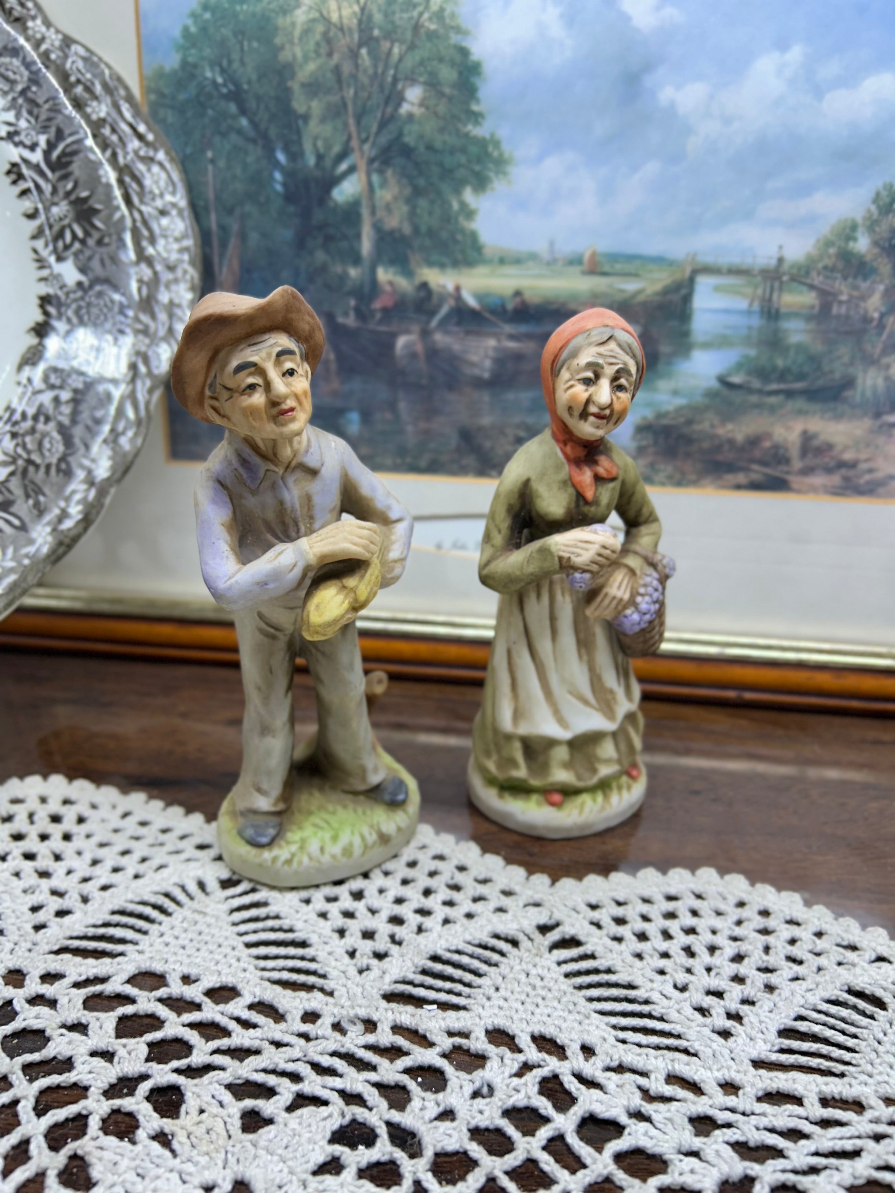 Vintage ARDCO ceramic figurines depict an elderly couple