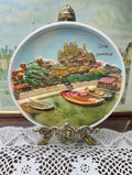 Vintage souvenir decorative wall plate features a 3D molded scene of the "Islas Canarias" 7”