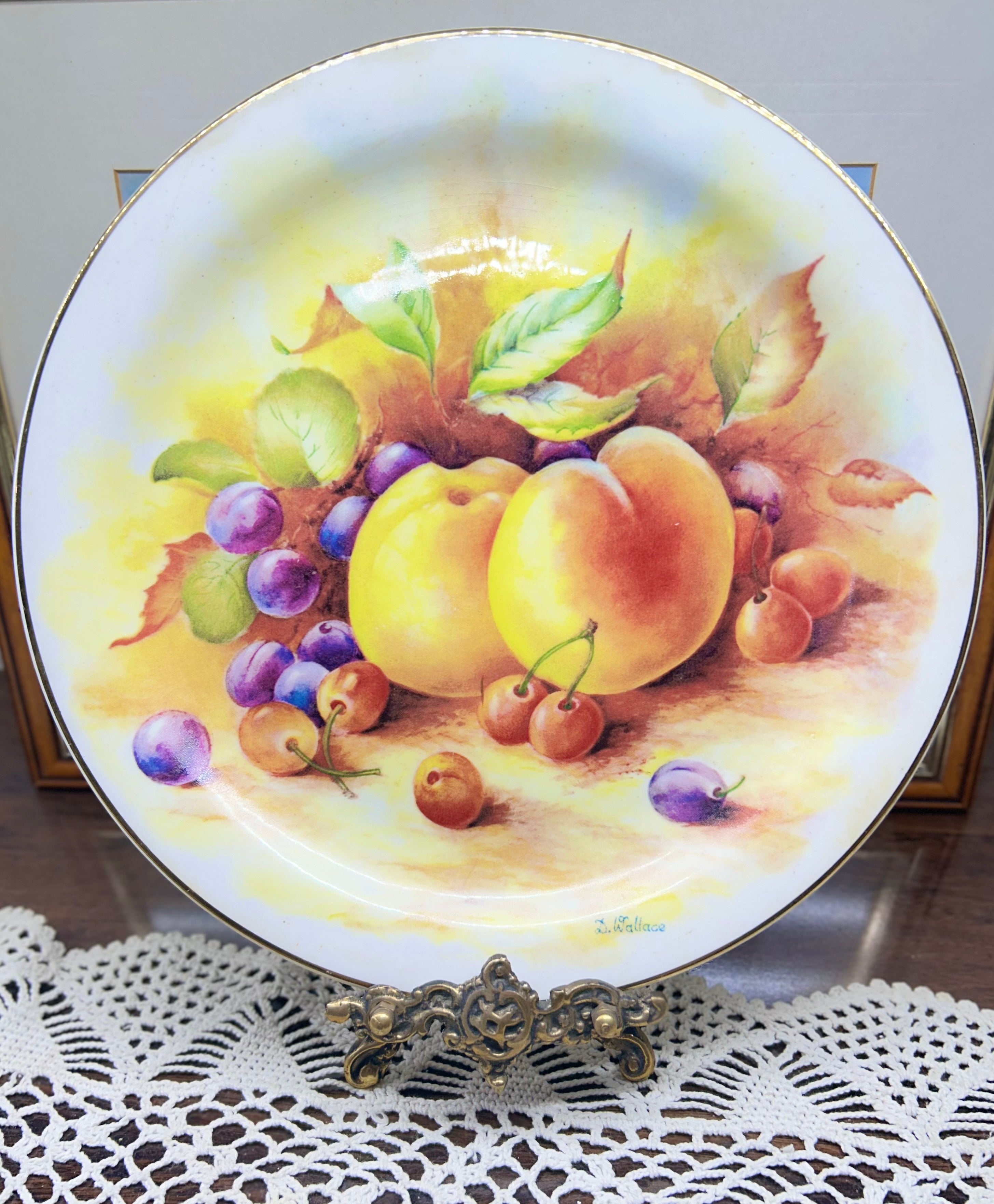 Vintage wall decorative plate featuring fruit motifs painted by D. Wallace
