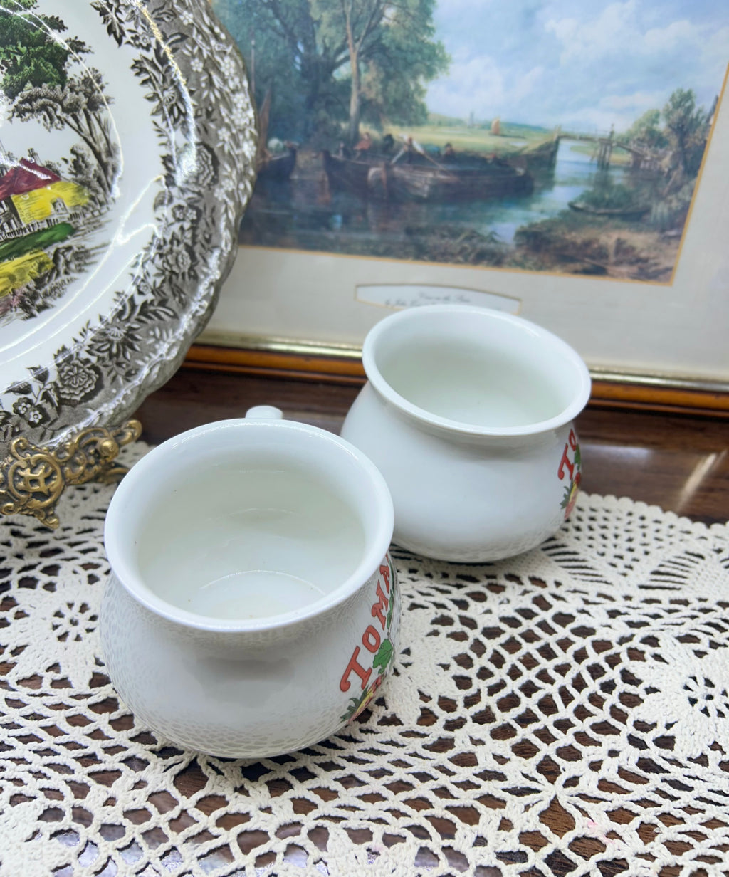 Retro ceramic soup mugs featuring tomato Soup recipe design.