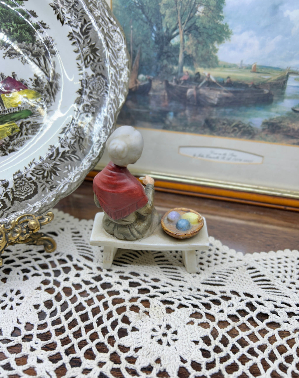 Vintage capodimonte figurine featuring an old lady sitting on a bench —  5”