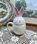 Adorable bunny-themed ceramic mug featuring a lid — airtight