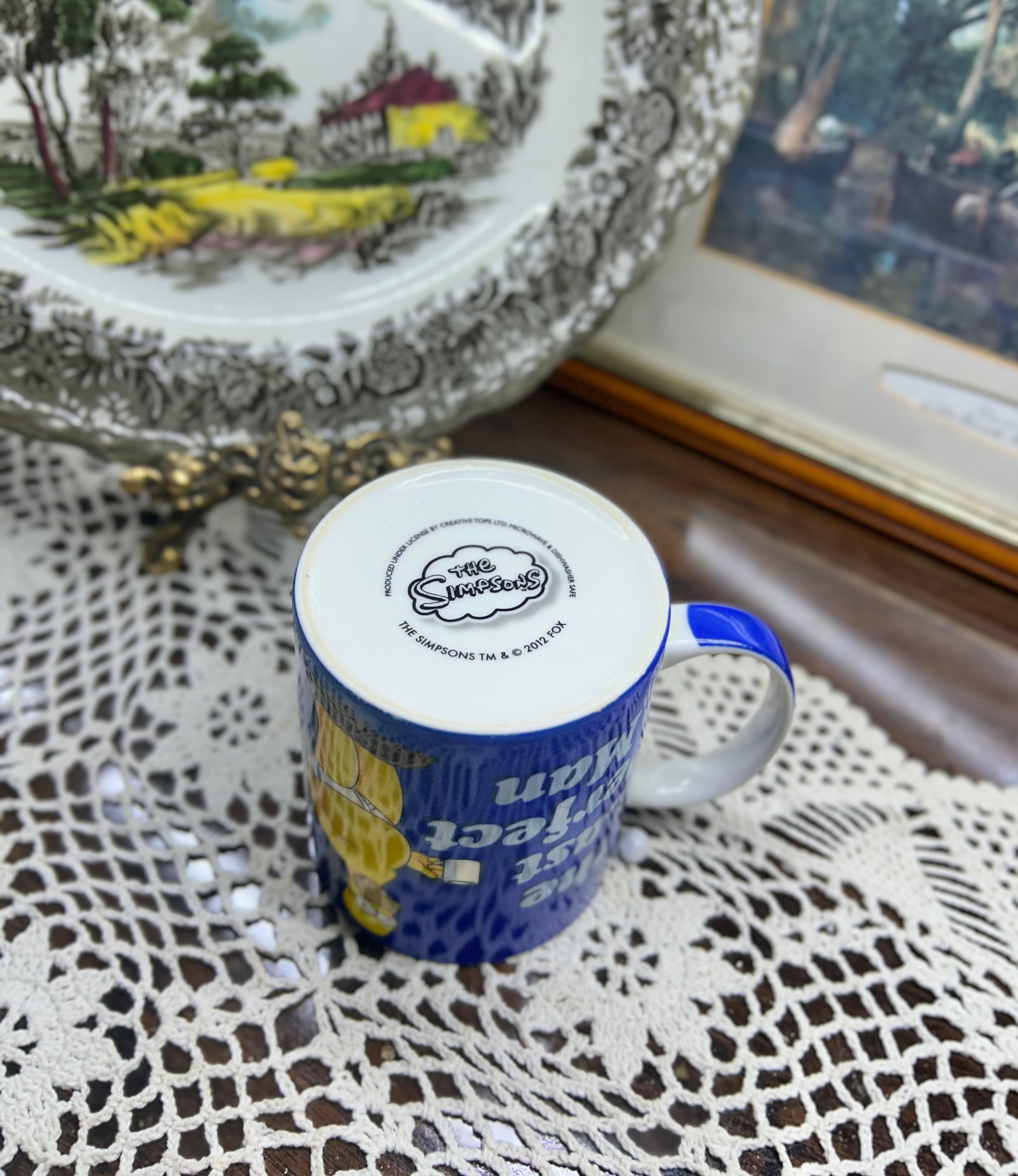 Homer Simpson “ The last perfect man” mug — ceramic