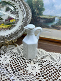 Vintage Xcell white porcelain oil or vinegar cruet with a stopper