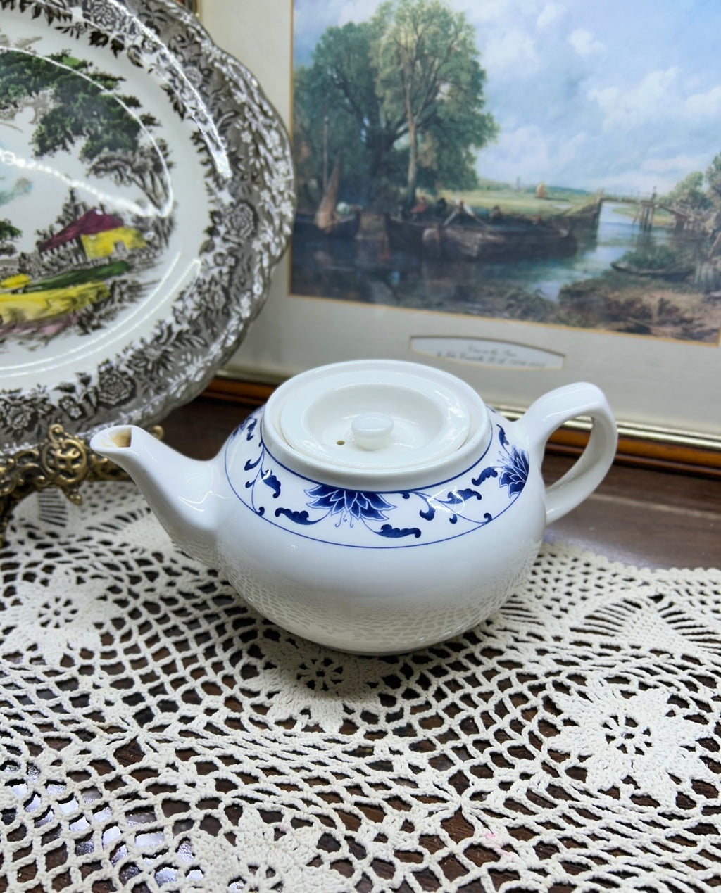 Classic white teapot by the cameo China Blue Lotus collection.