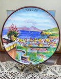 hand-painted ceramic decorative plate featuring a scene from Sorrento, Italy.
