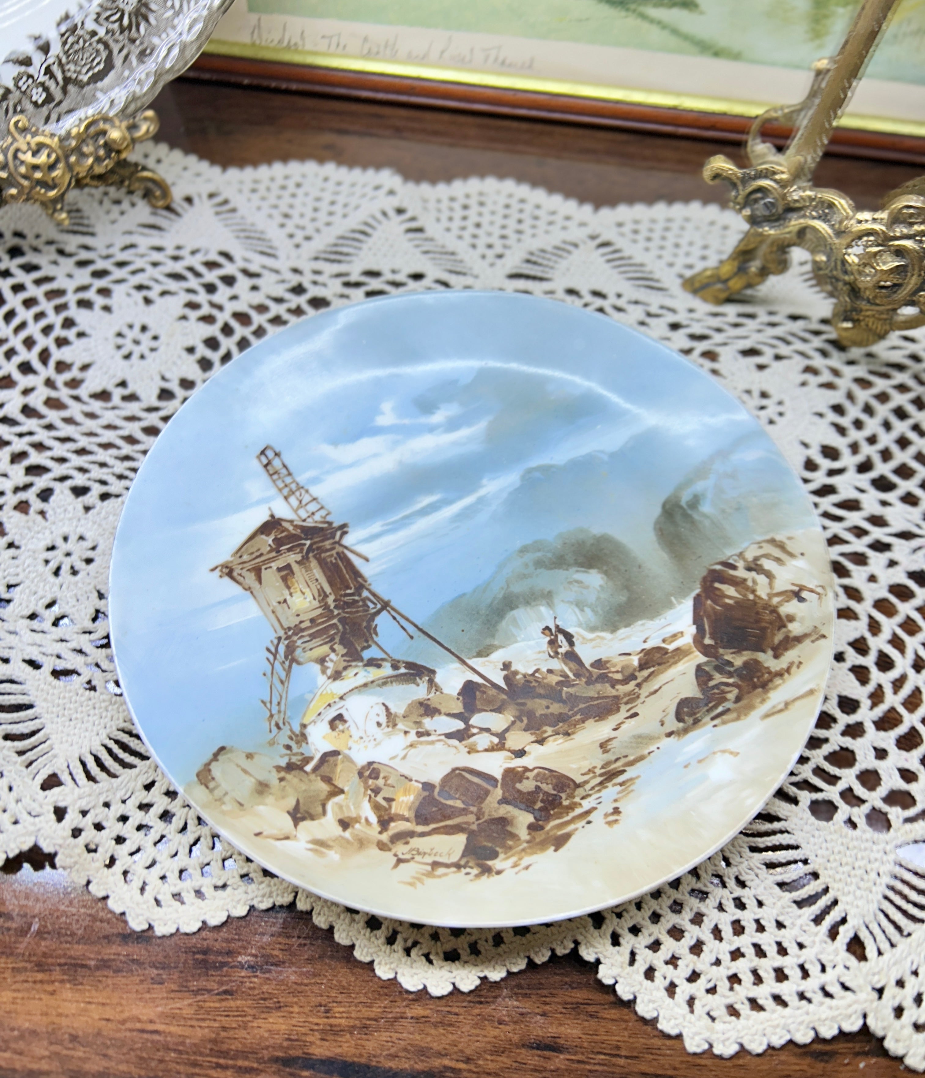 Vintage Dutch scenery hand-painted wall plate with a scene of a rustic windmill landscape 8”
