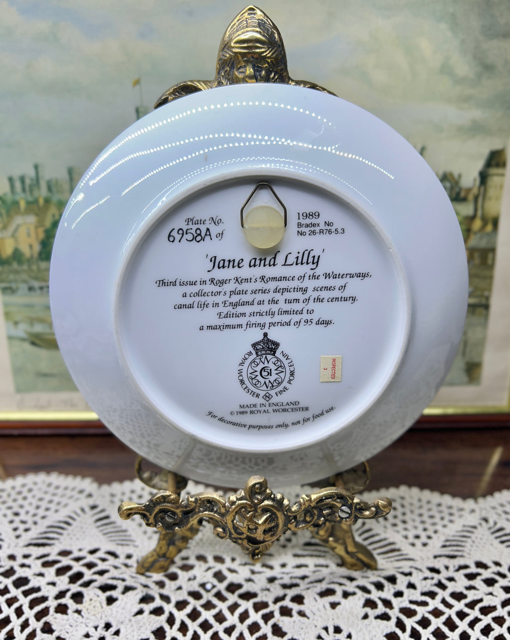 Royal Worcester titled "Jane and Lilly" wall plate from the Romance of the Waterways series 7”