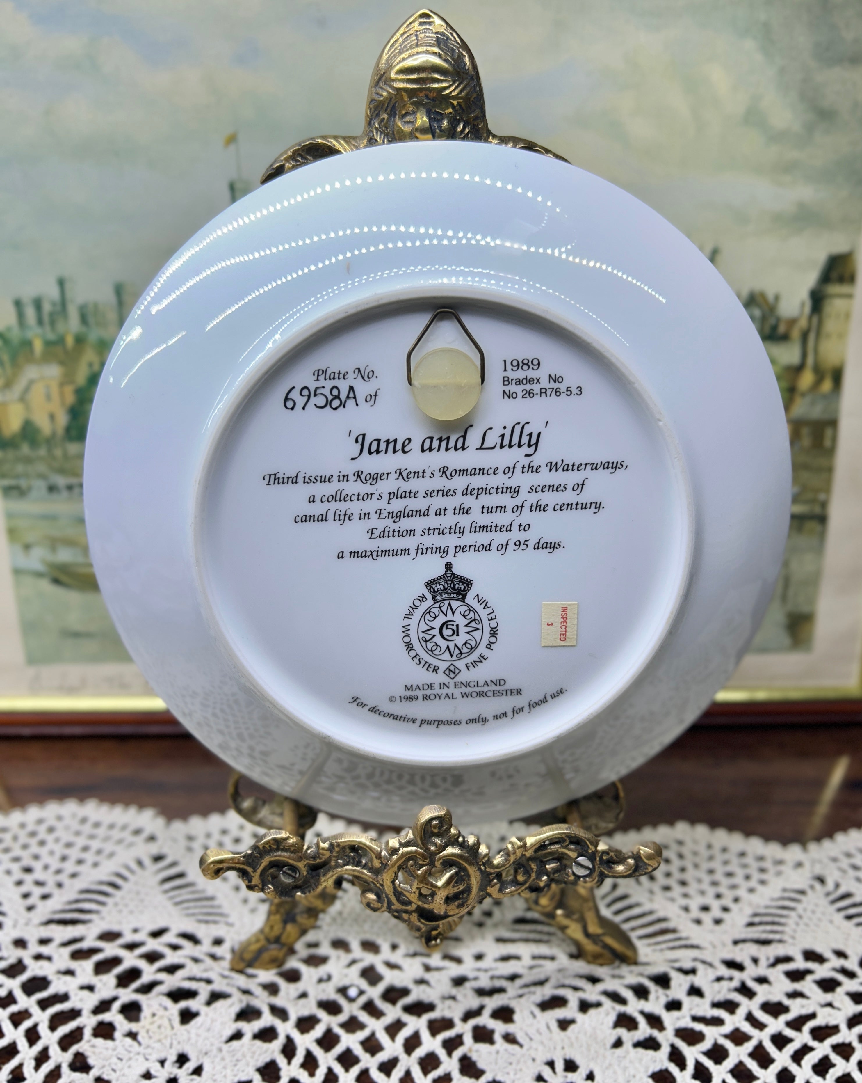 Royal Worcester titled "Jane and Lilly" wall plate from the Romance of the Waterways series 7”