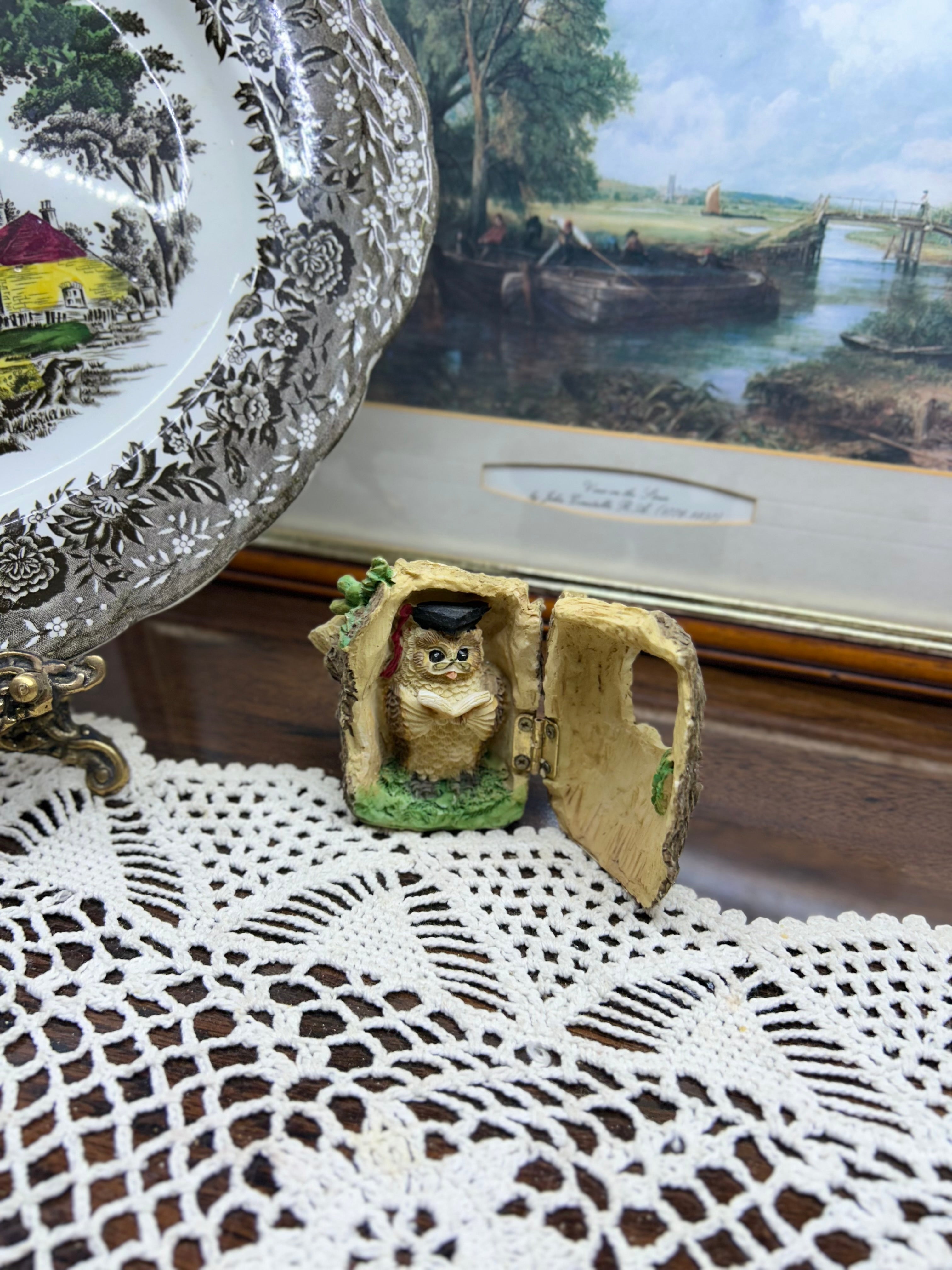 Vintage scholarly owl figurine depicted reading inside a tree stump - 1995