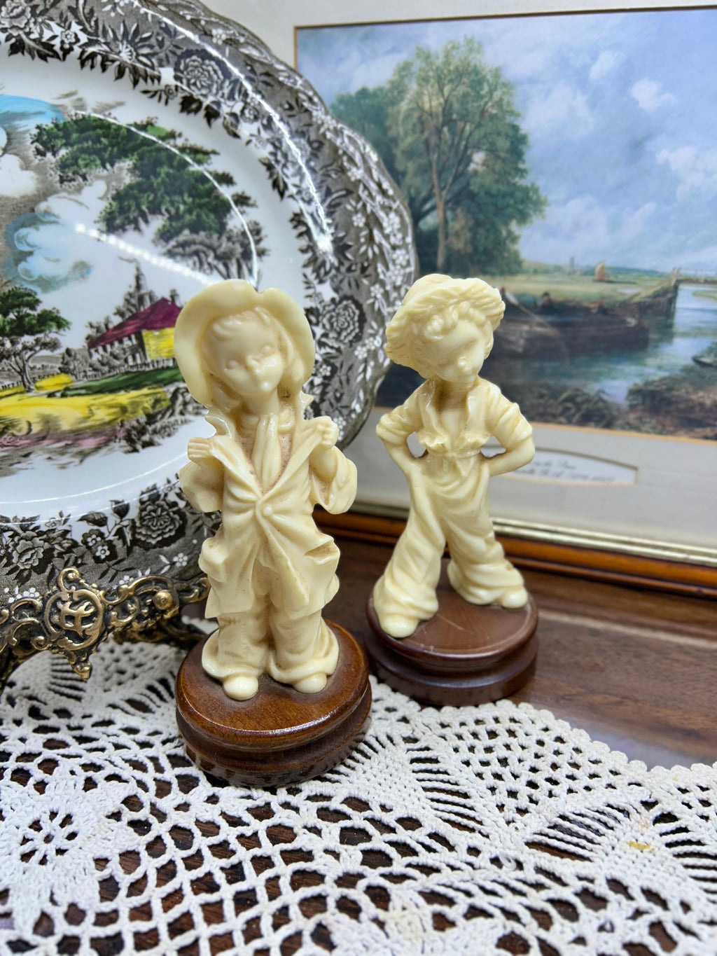 Vintage pair of Italian-made sculptures with wooden bases