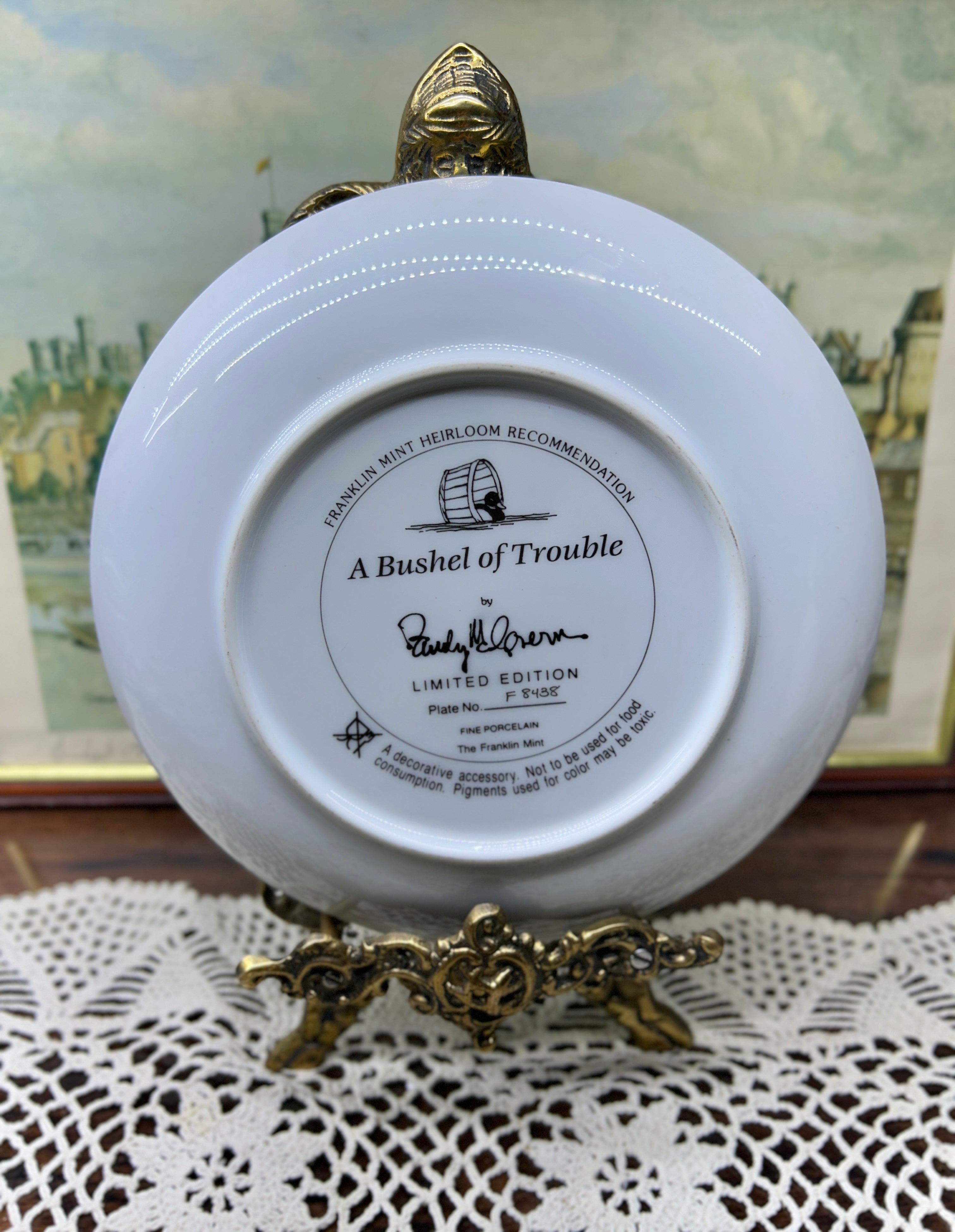 Franklin Mint Heirloom collector wall plate titled "A Bushel of Trouble" 7”