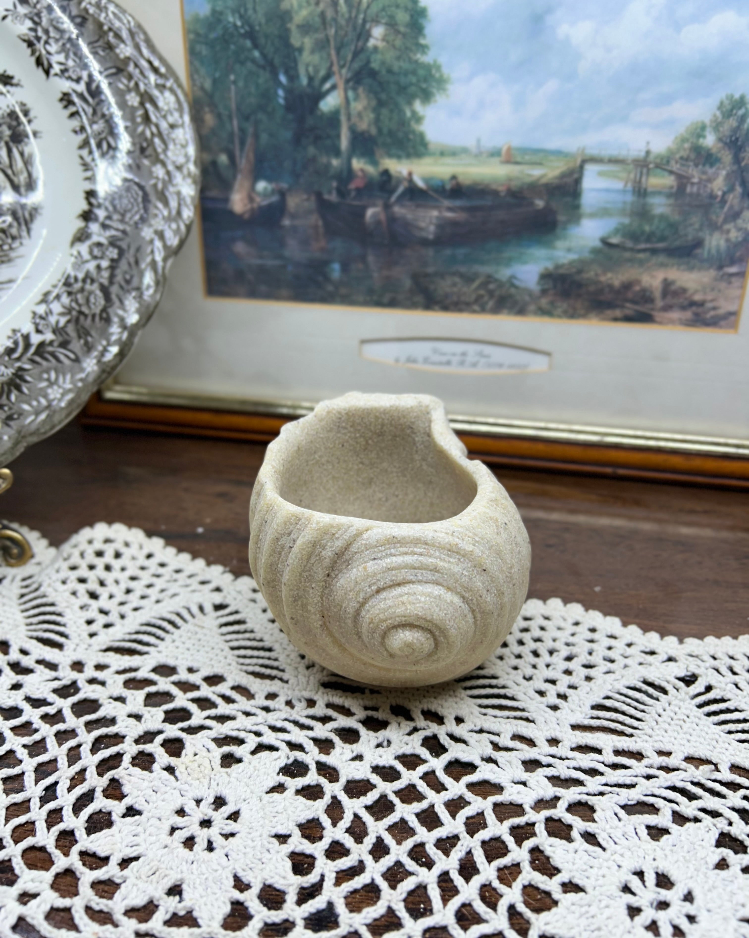 Hand-crafted seashell snail shaped planter