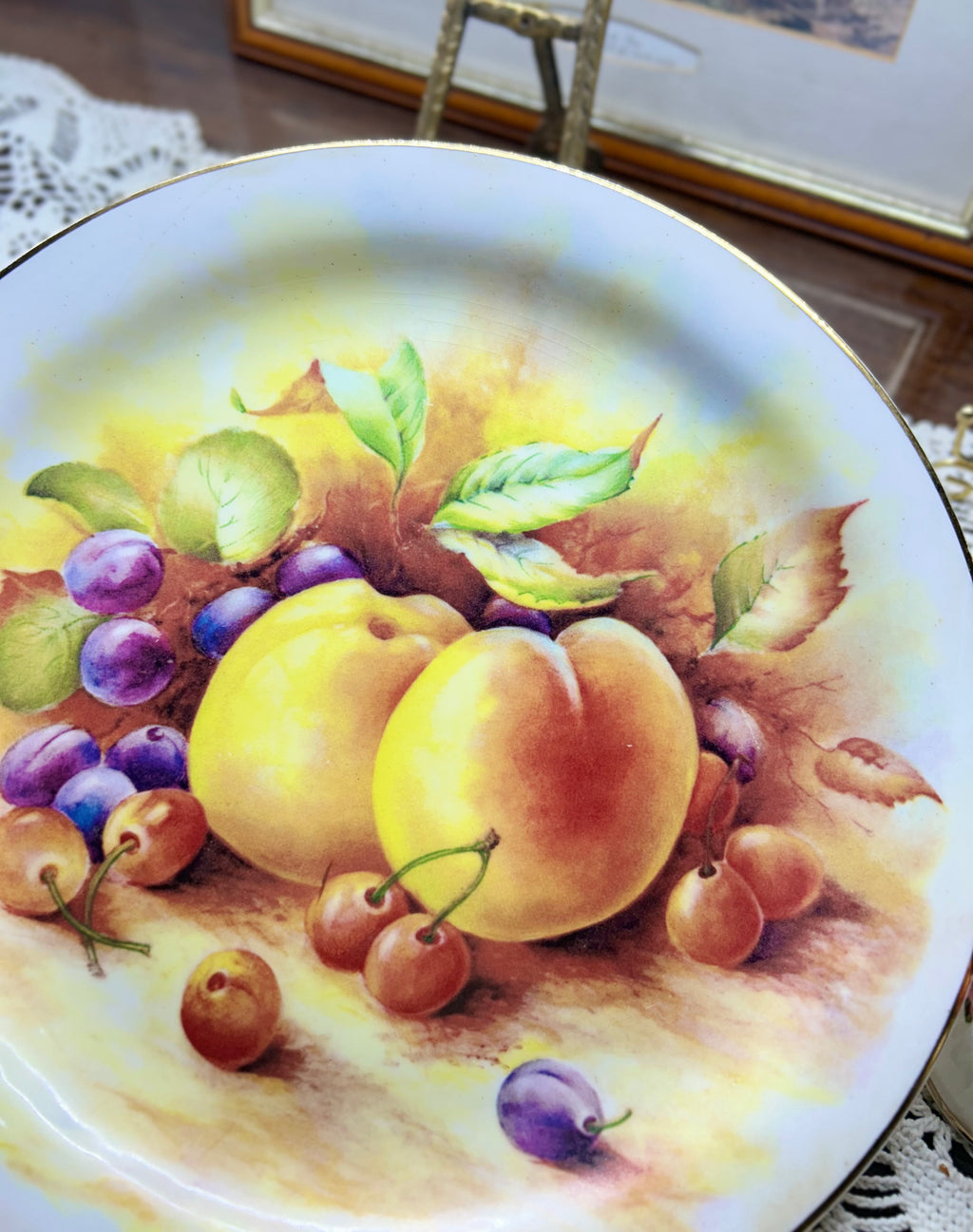 Vintage wall decorative plate featuring fruit motifs painted by D. Wallace