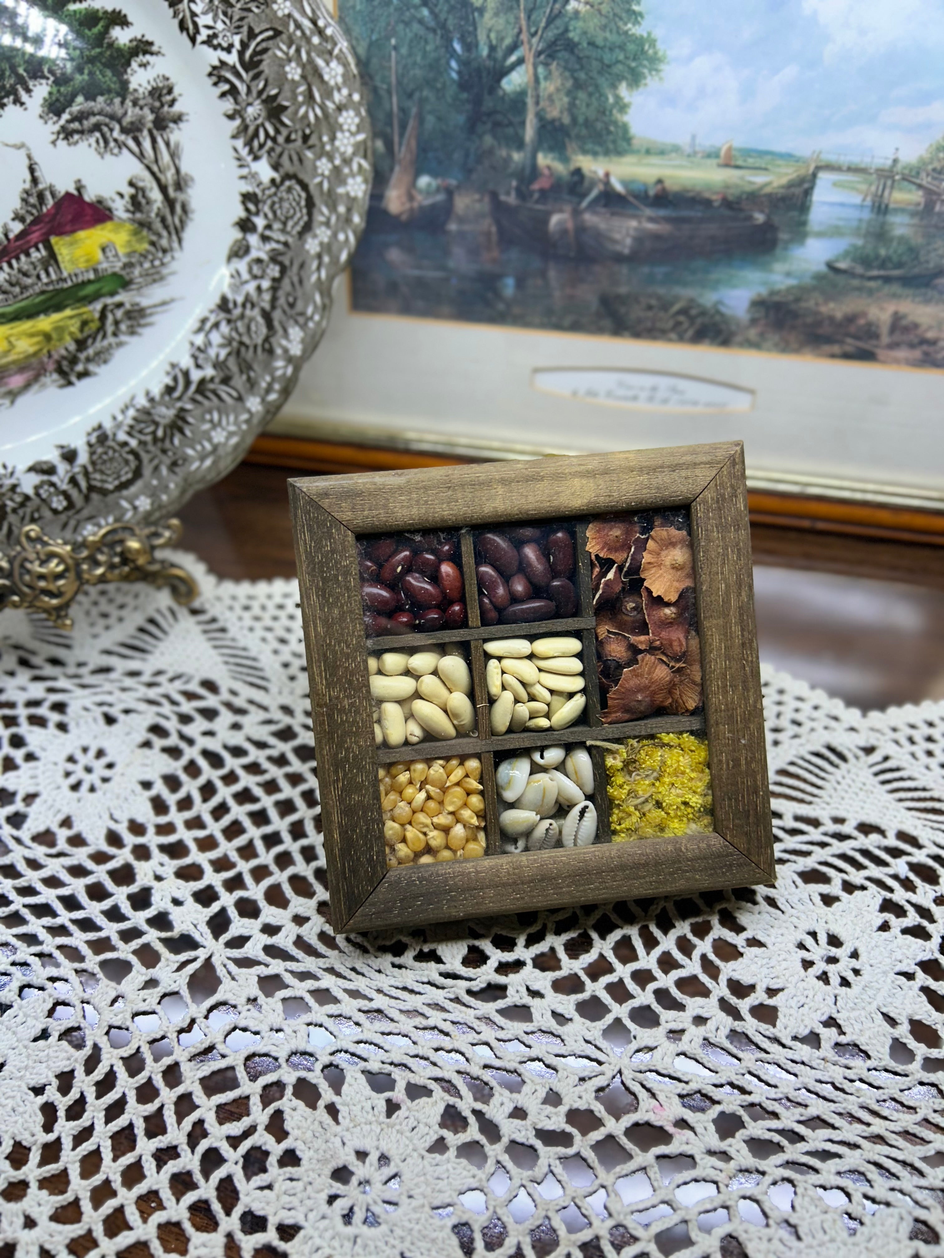 Wooden shadow box with dried seeds and grain for kitchen wall decor