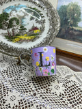 Floral ceramic initial “L” mug