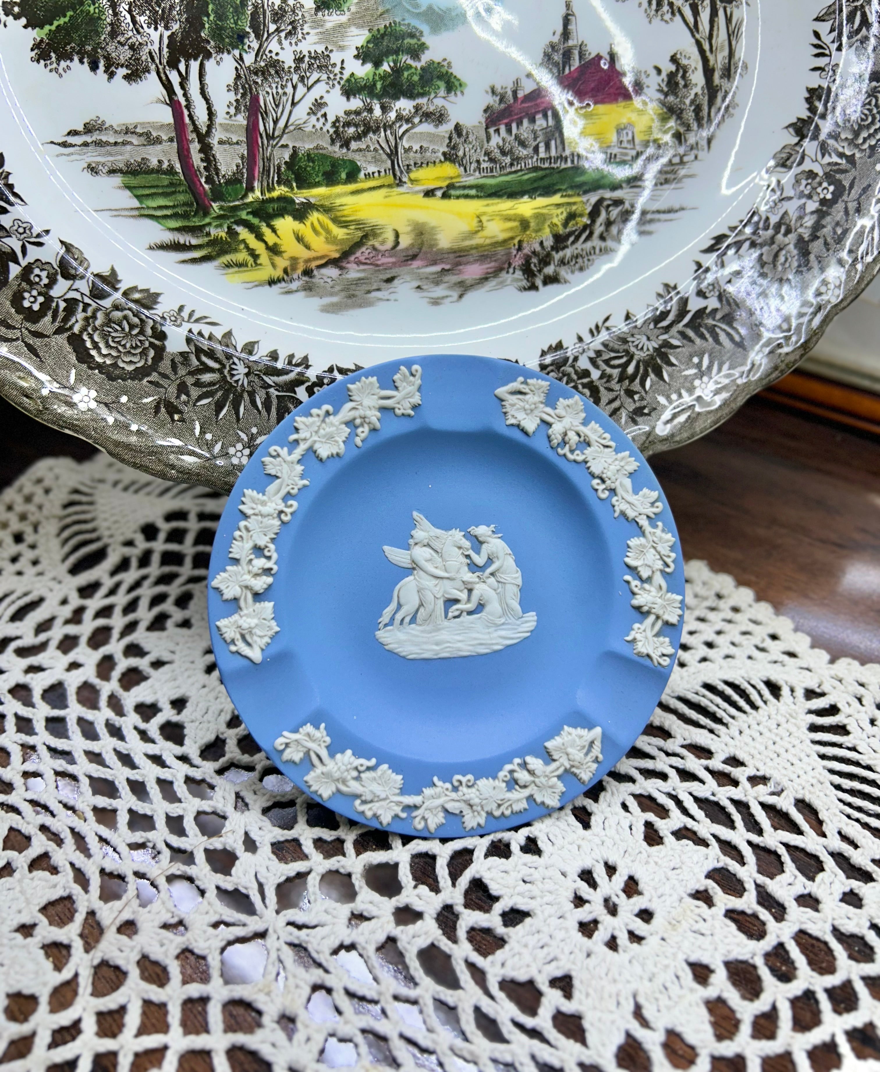 Vintage Wedgwood blue Jasperware ashtray — featuring white relief designs.
