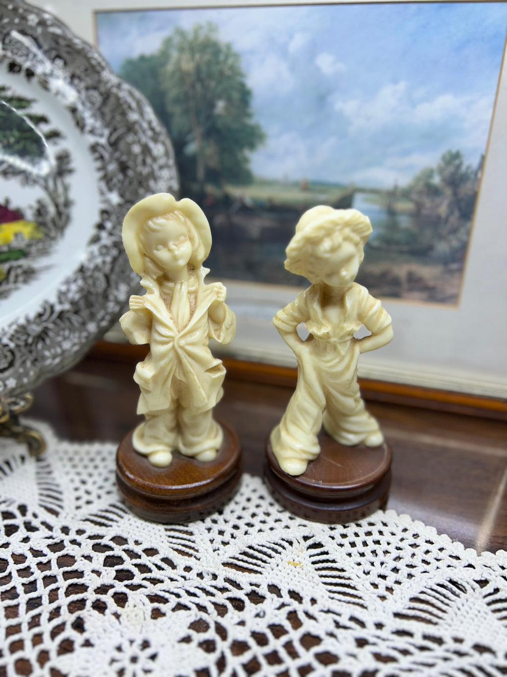 Vintage pair of Italian-made sculptures with wooden bases