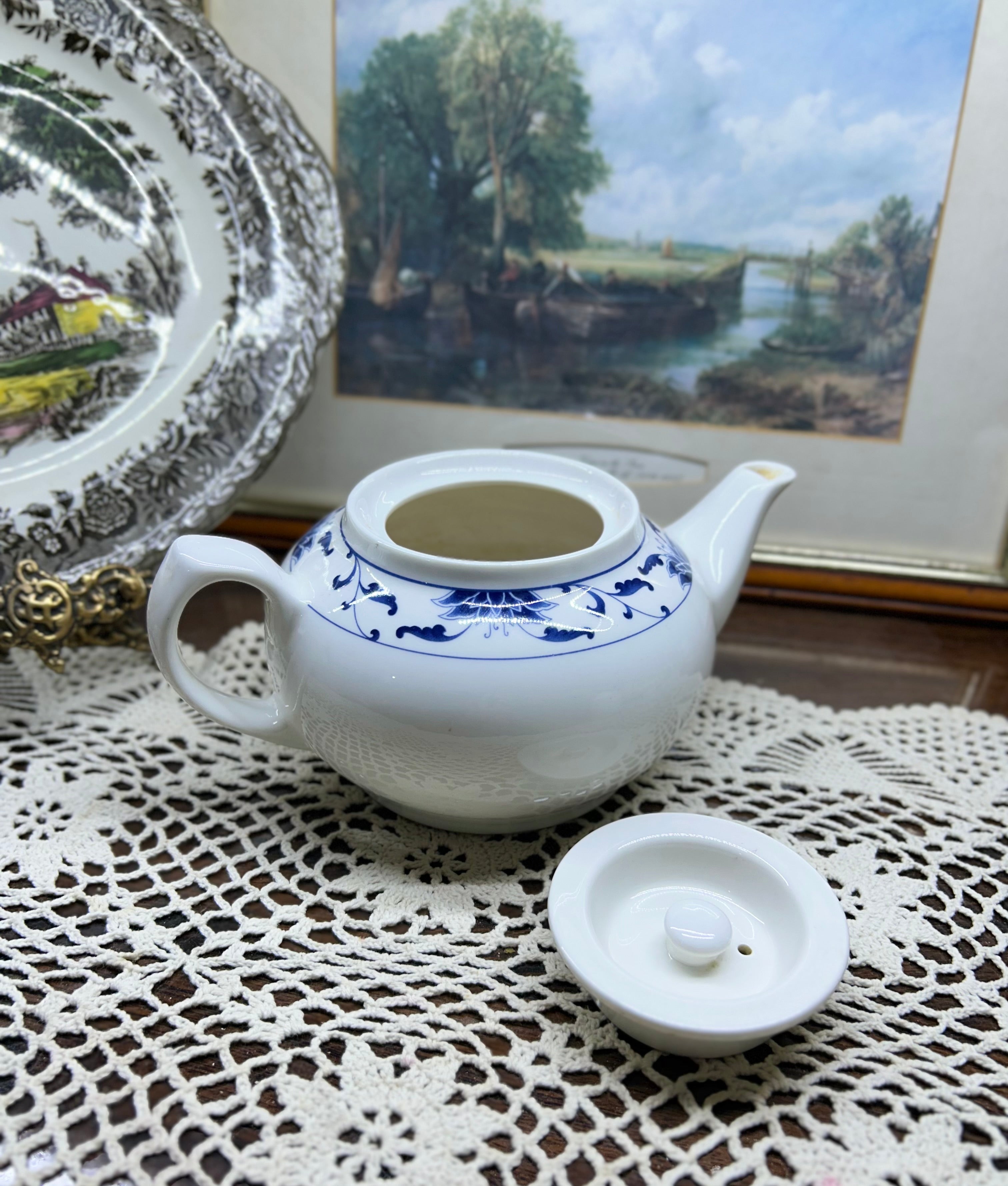Classic white teapot by the cameo China Blue Lotus collection.