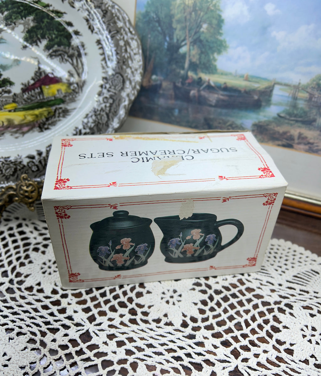Glossy set of creamer & sugar pot adorned with ink iris floral designs — England