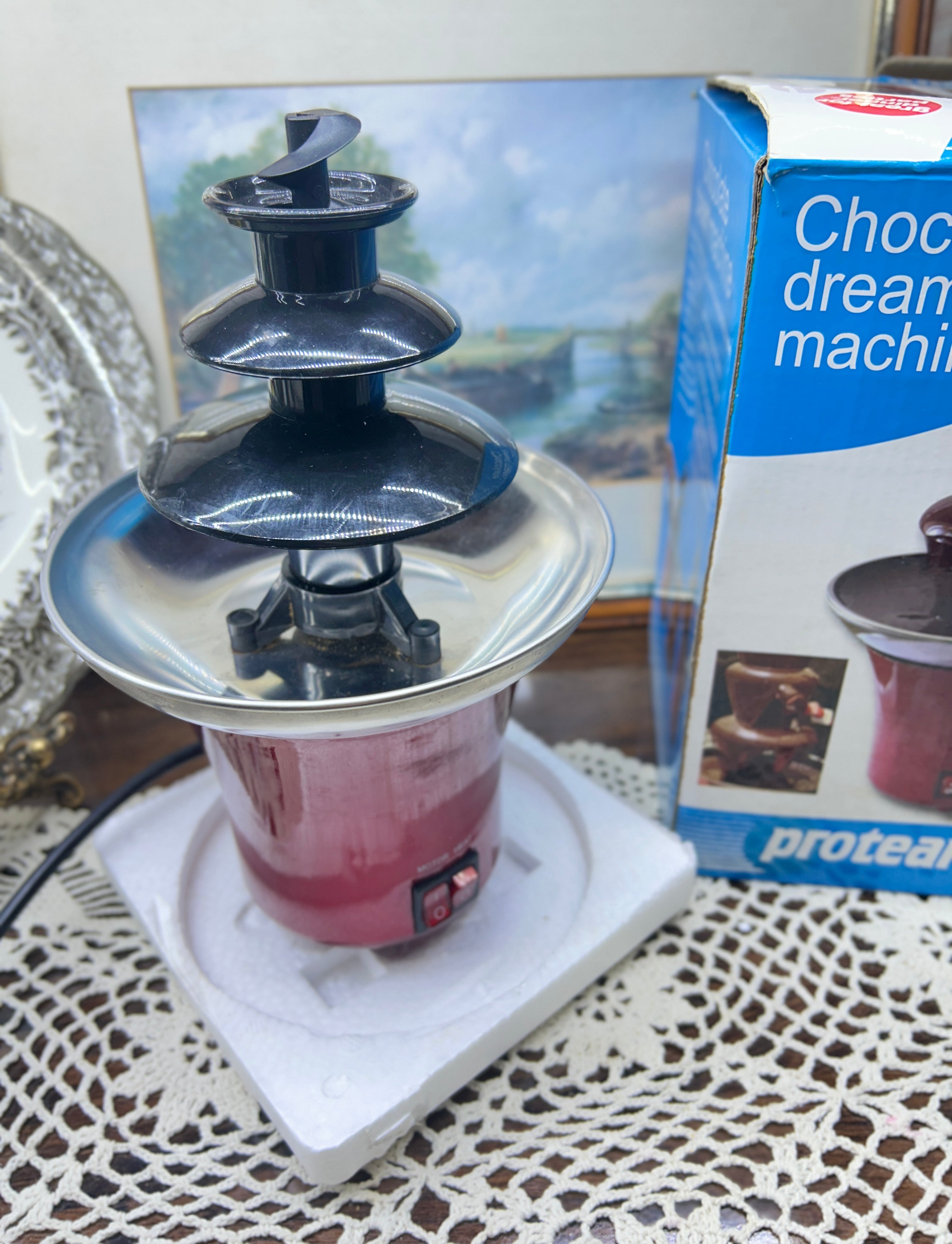 Proteam Chocolate Dream Machine, a mini electric 3-tier fondue fountain designed for dipping fruits and treats — boxed