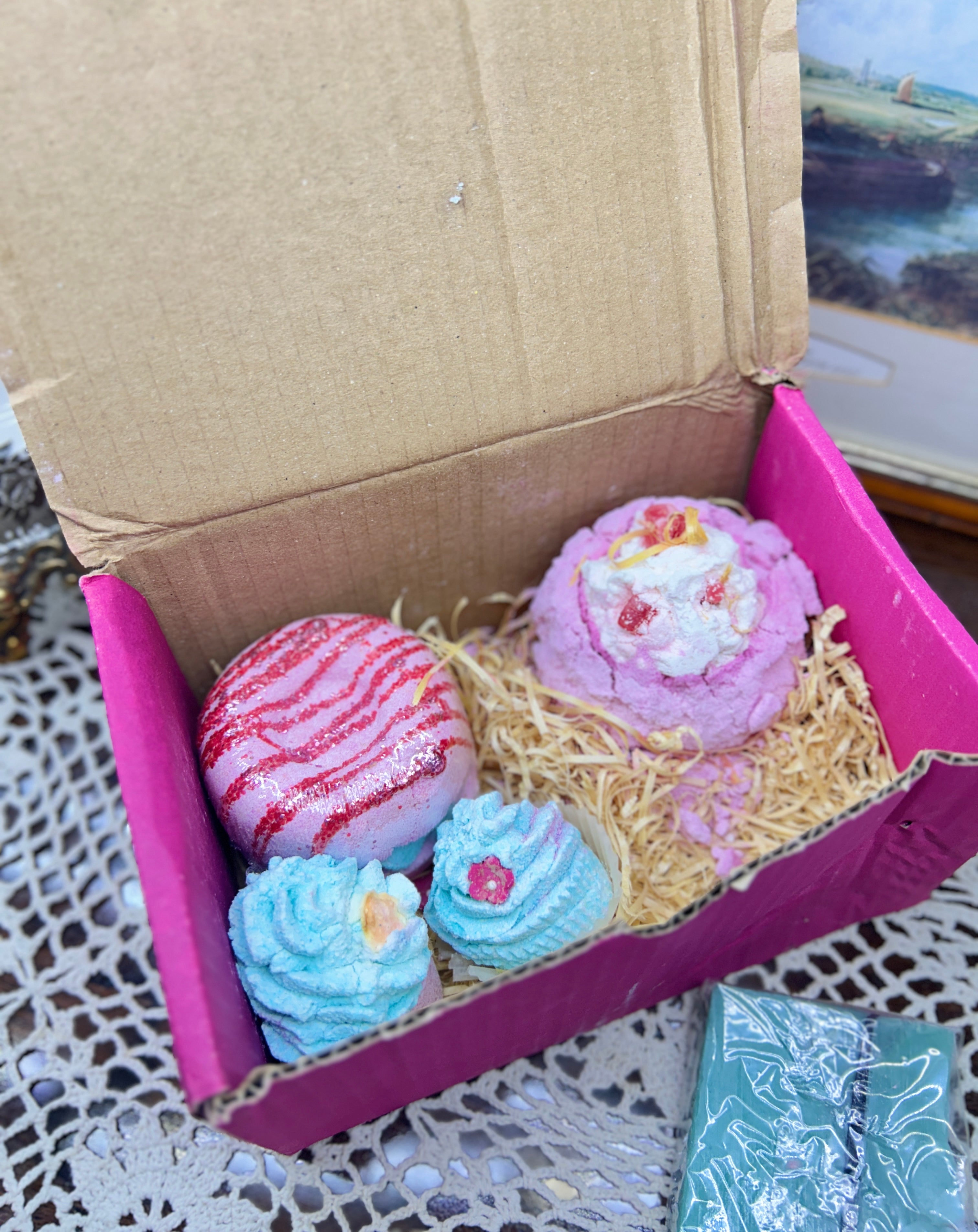 Bomb Cosmetics gift set featuring dessert-themed bath bombs and handmade soap — boxed