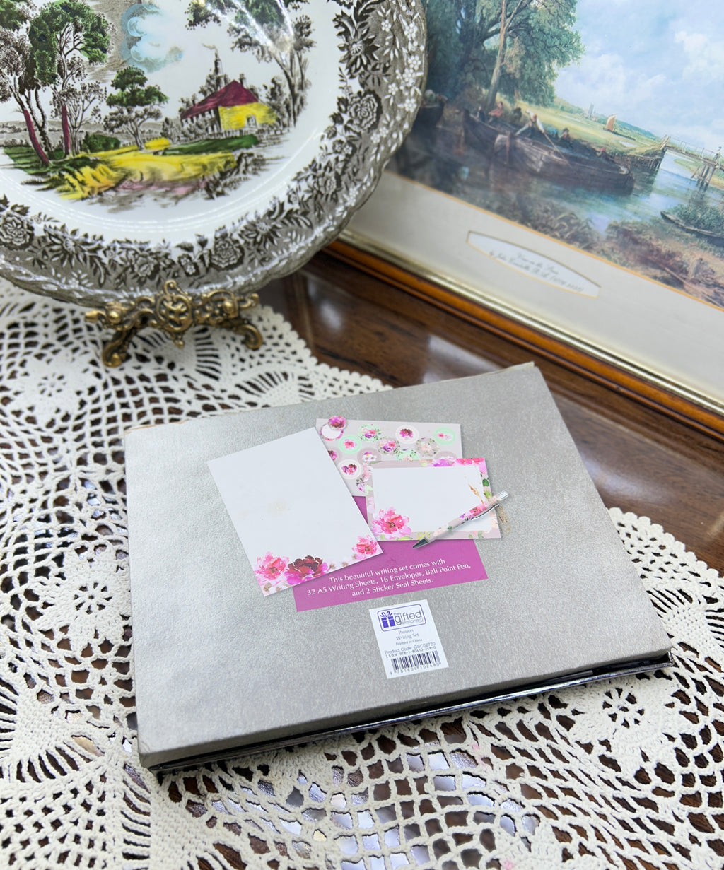 Paragon "Passion" writing set featuring a floral design on a pink background — boxed