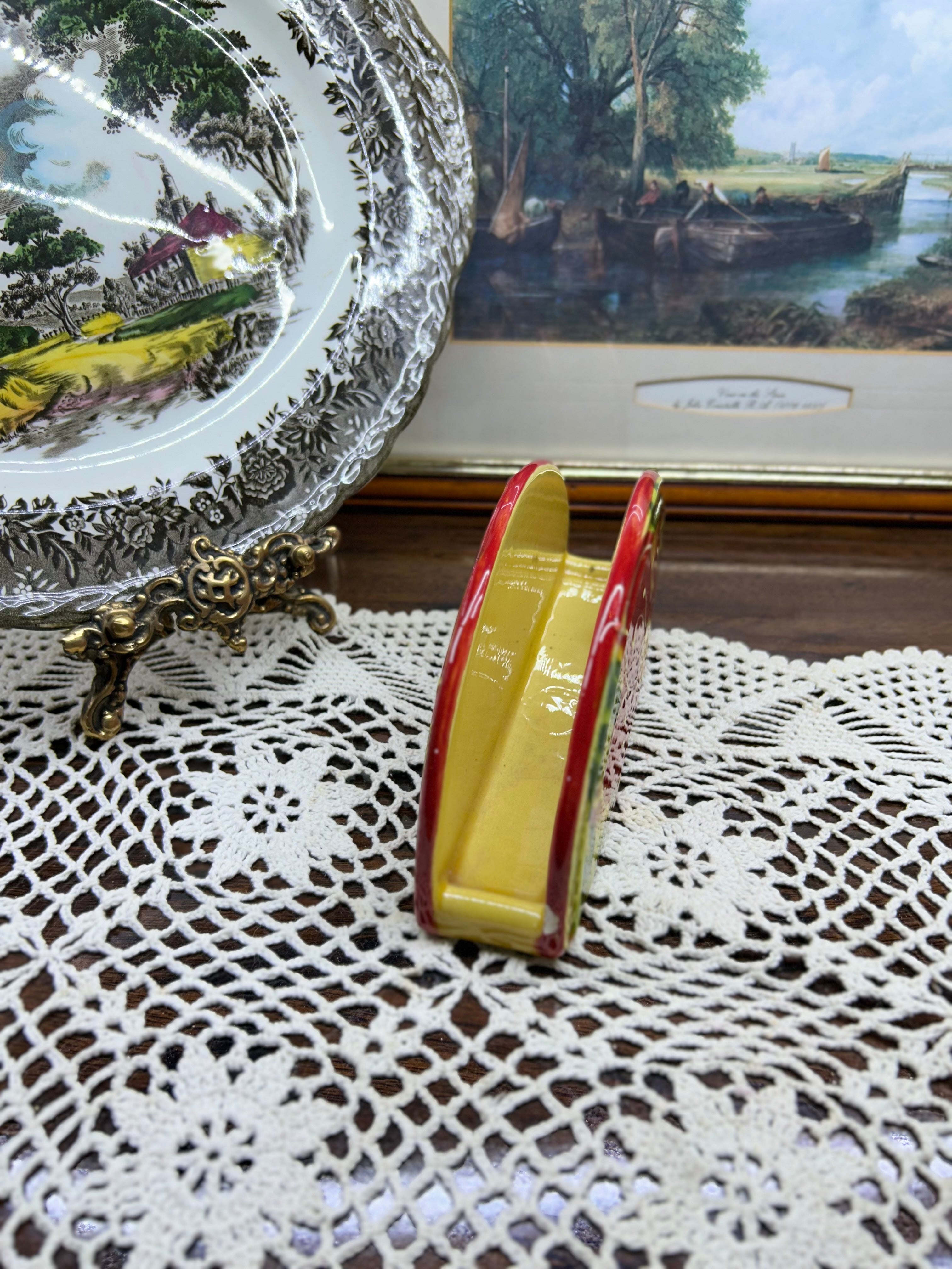 Hand-painted Italian ceramic napkin holder — featuring a hand-painted Tuscan floral motif.