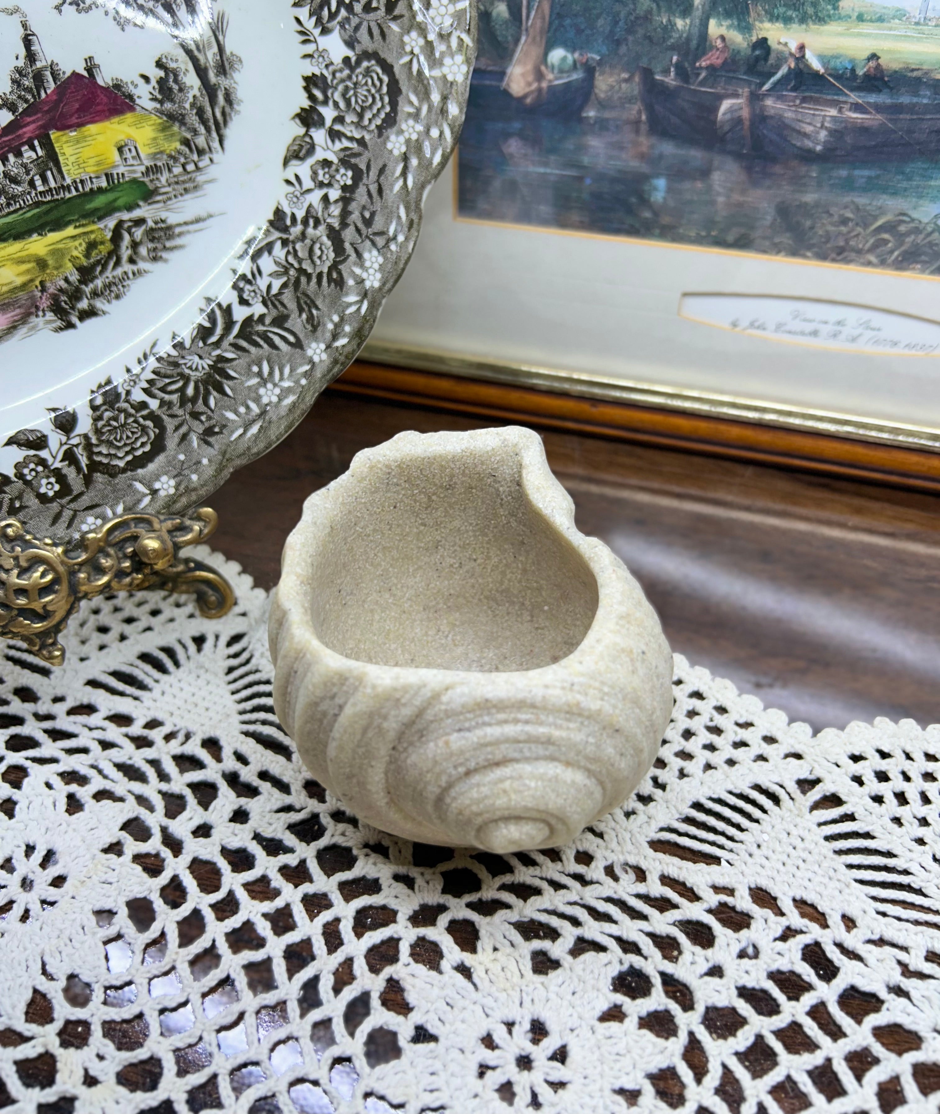 Hand-crafted seashell snail shaped planter
