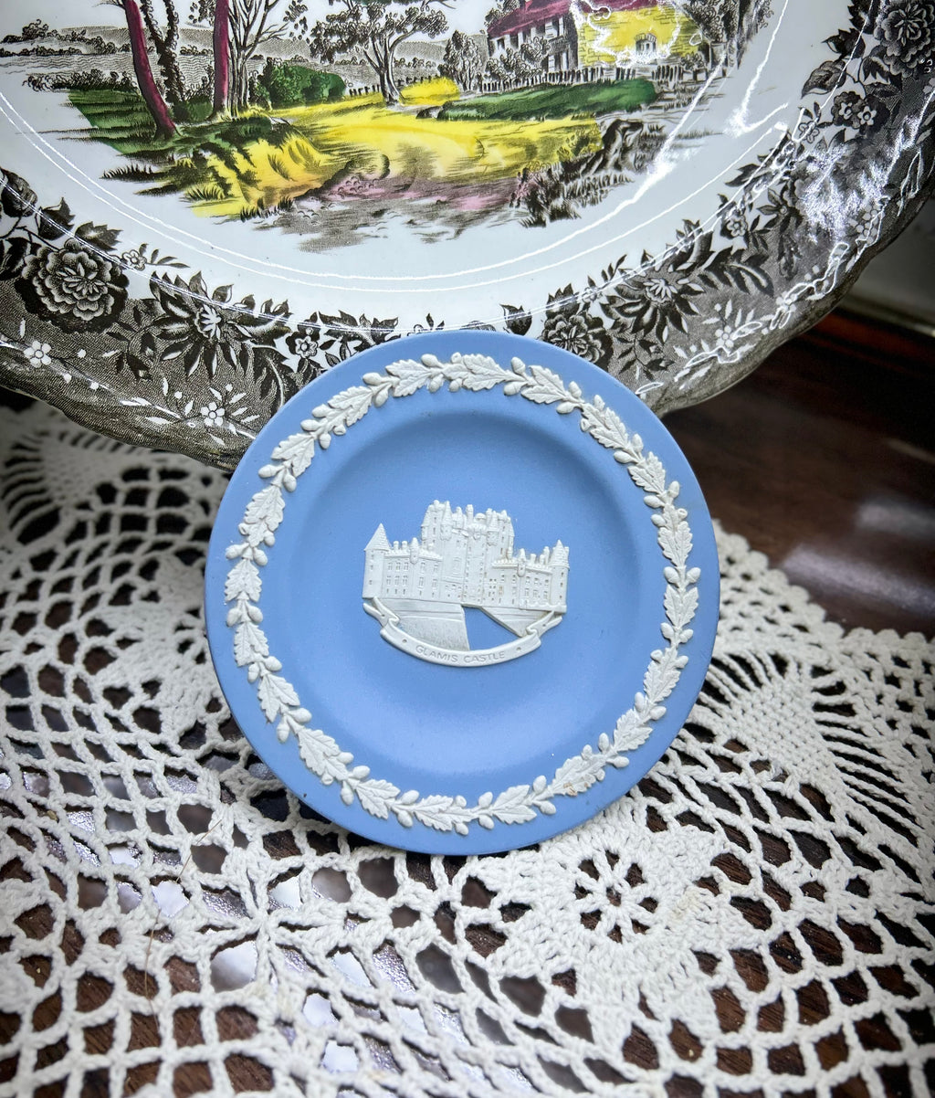 Wedgwood blue jasperware trinket plates — featuring white cameo reliefs of various landmark scenes