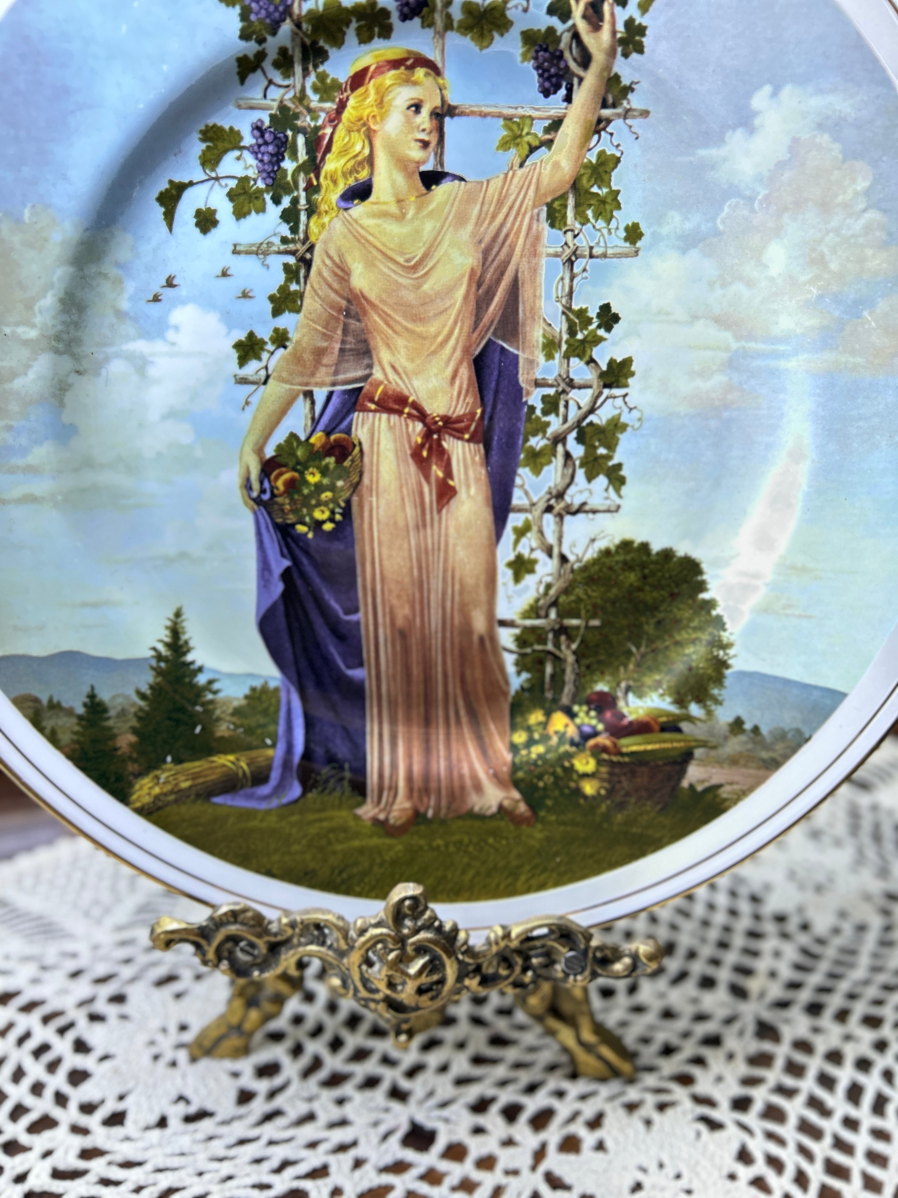 Vintage decorative wall plate "Seasons of the Year" series by artist Charlotte Sternberg 12”