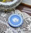 Wedgwood blue jasperware trinket plates — featuring white cameo reliefs of various landmark scenes