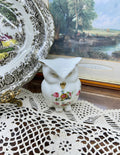 Crown Staffordshire owl ornament features a "Cottage Garden" floral pattern and gold accents — England
