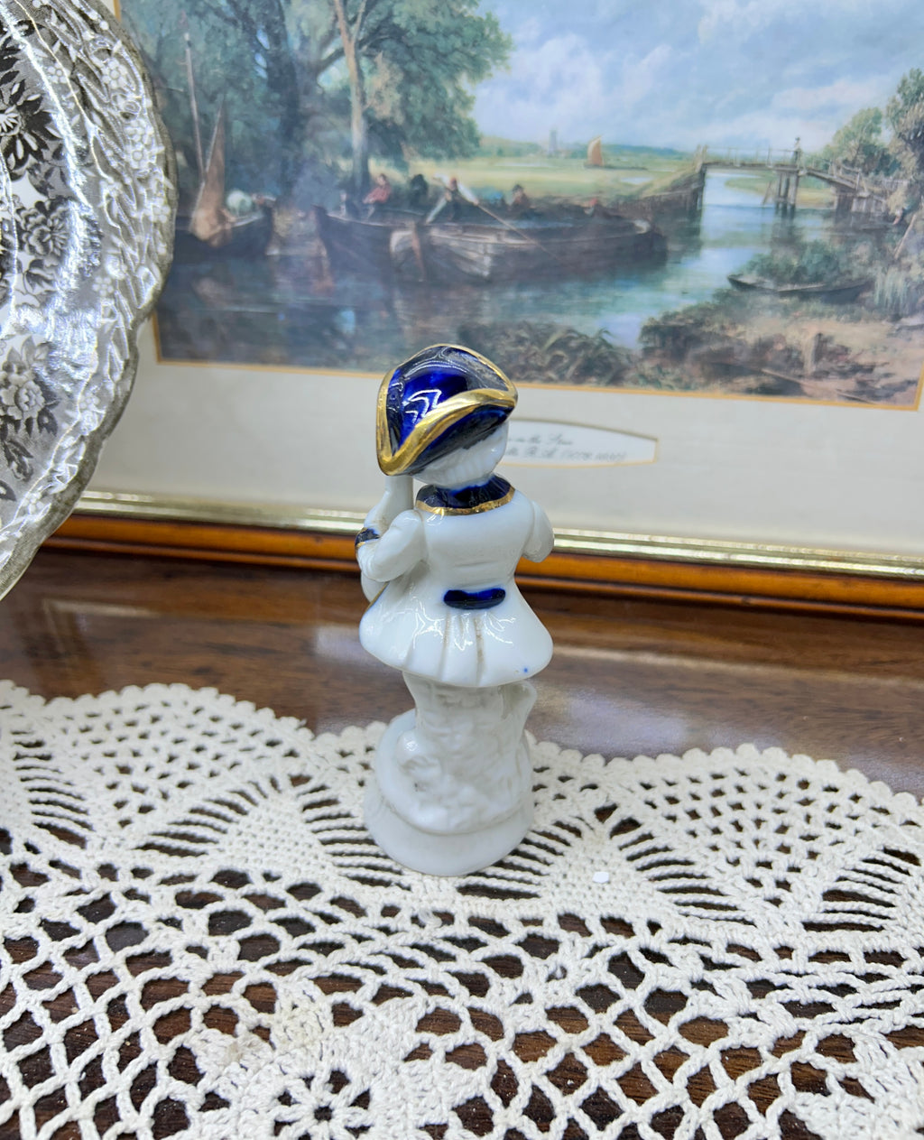 Vintage Capodimonte porcelain figurine features a boy playing a mandolin 5”