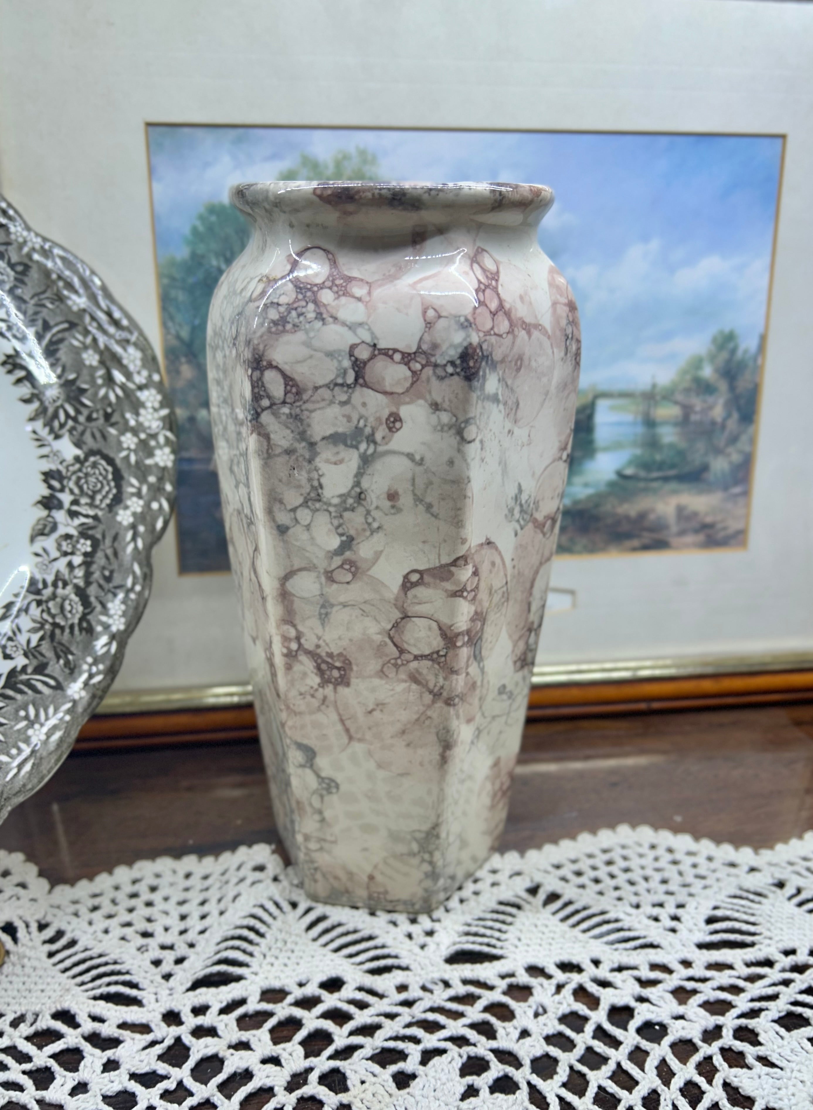 Vintage ceramic vase featuring a unique marbled or bubble-glaze pattern