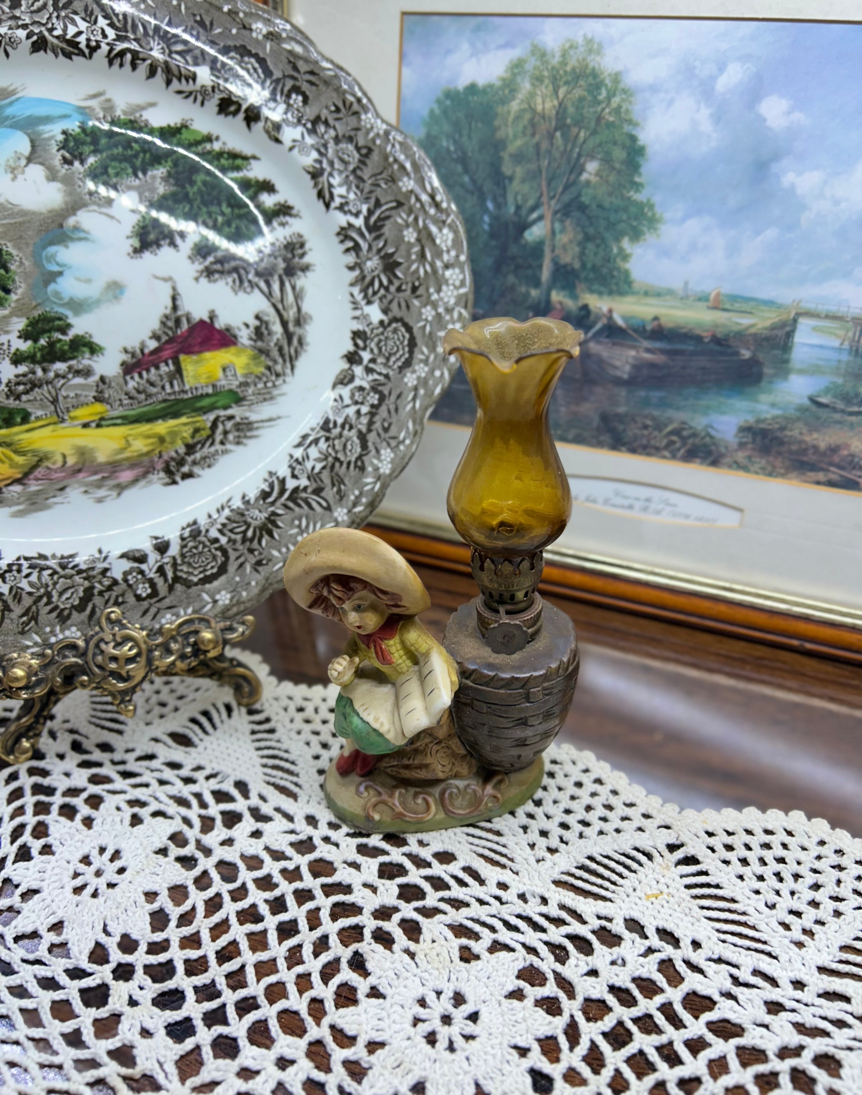 Vintage kerosene oil lamp with little girl with book in ceramic 
Height