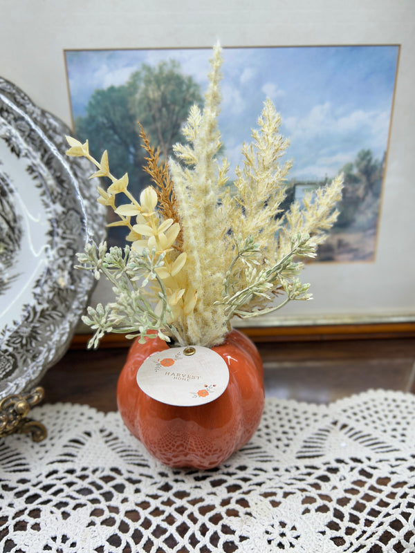 Harvest Home  orange pumpkin-shaped ceramic vase filled with dried pampas
