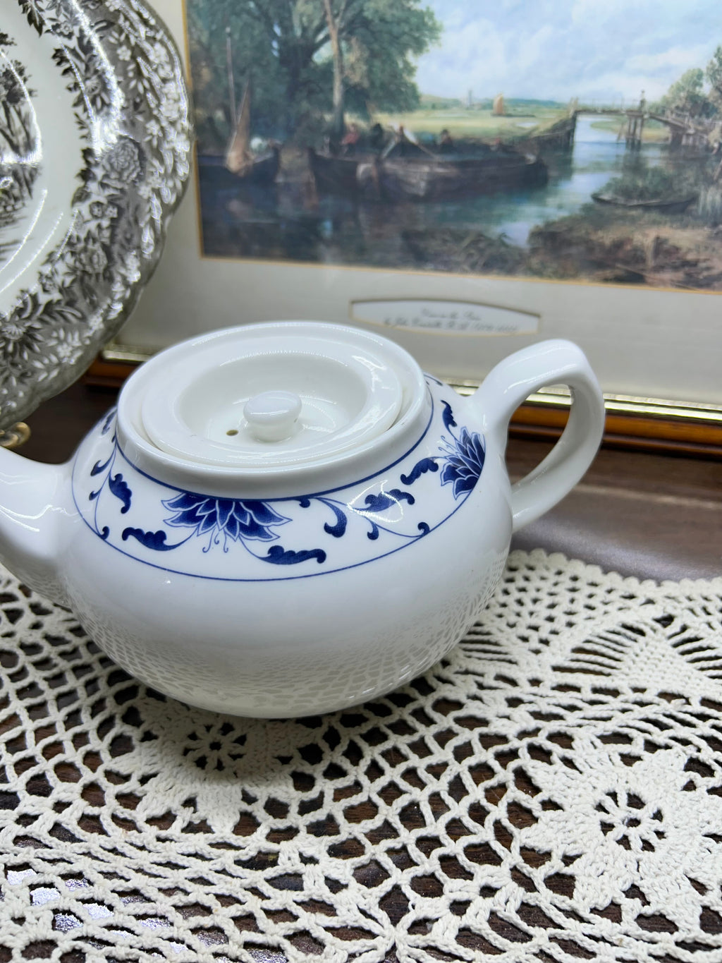 Classic white teapot by the cameo China Blue Lotus collection.