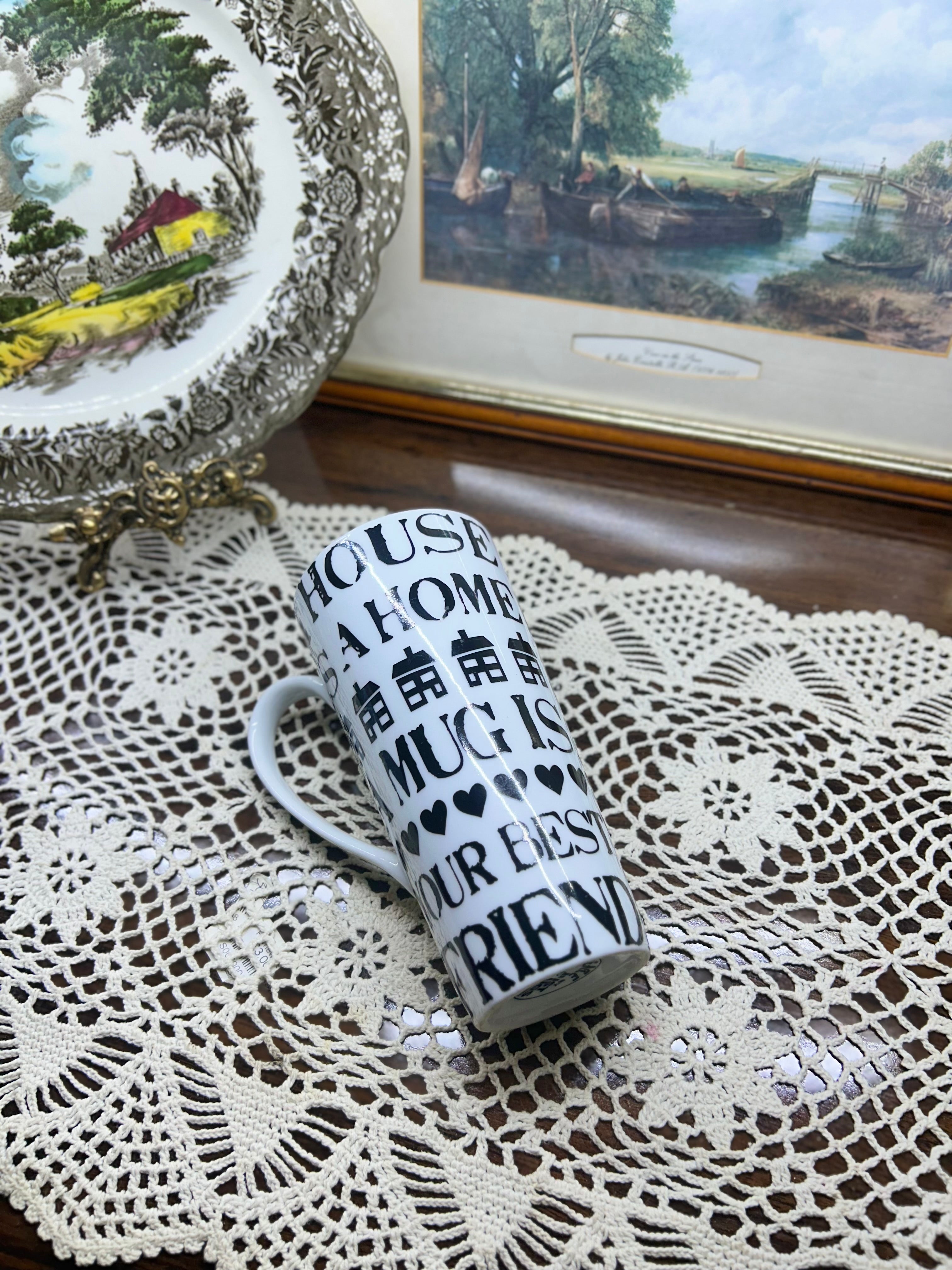 Tall ceramic handled mug