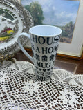 Tall ceramic handled mug