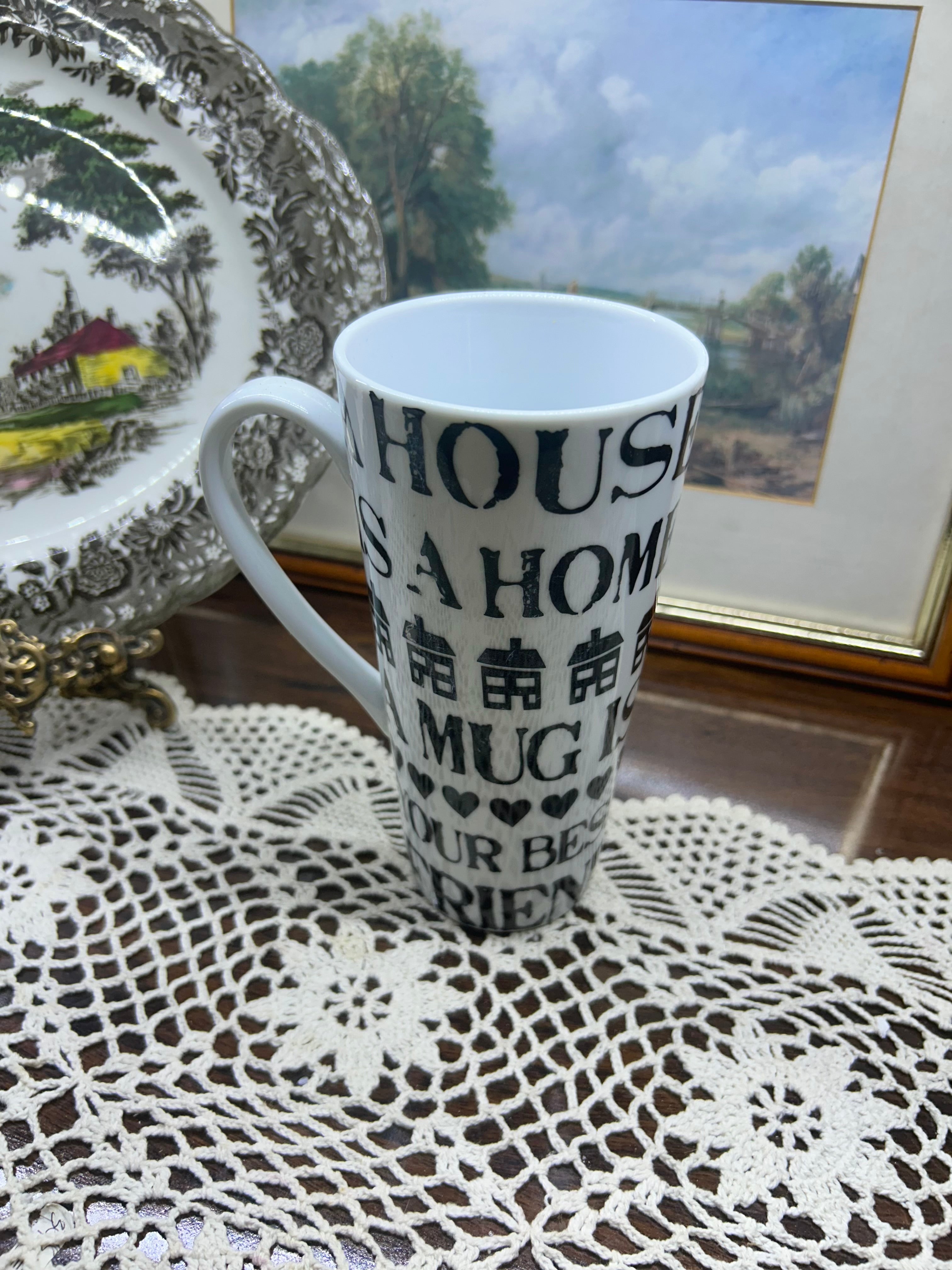 Tall ceramic handled mug