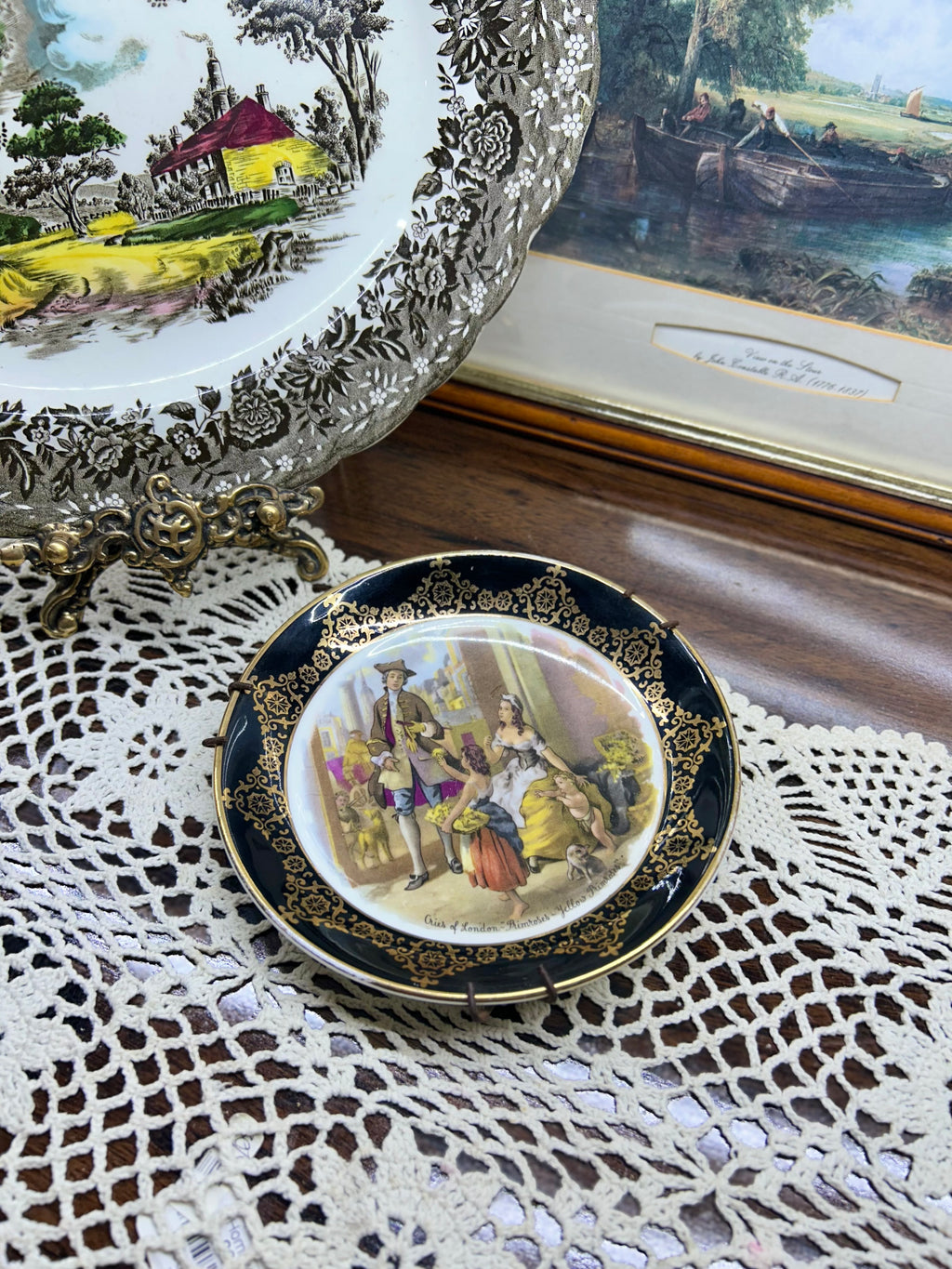 Vintage collector plate featuring a "Cries of London" scene, produced by Regency Bone China