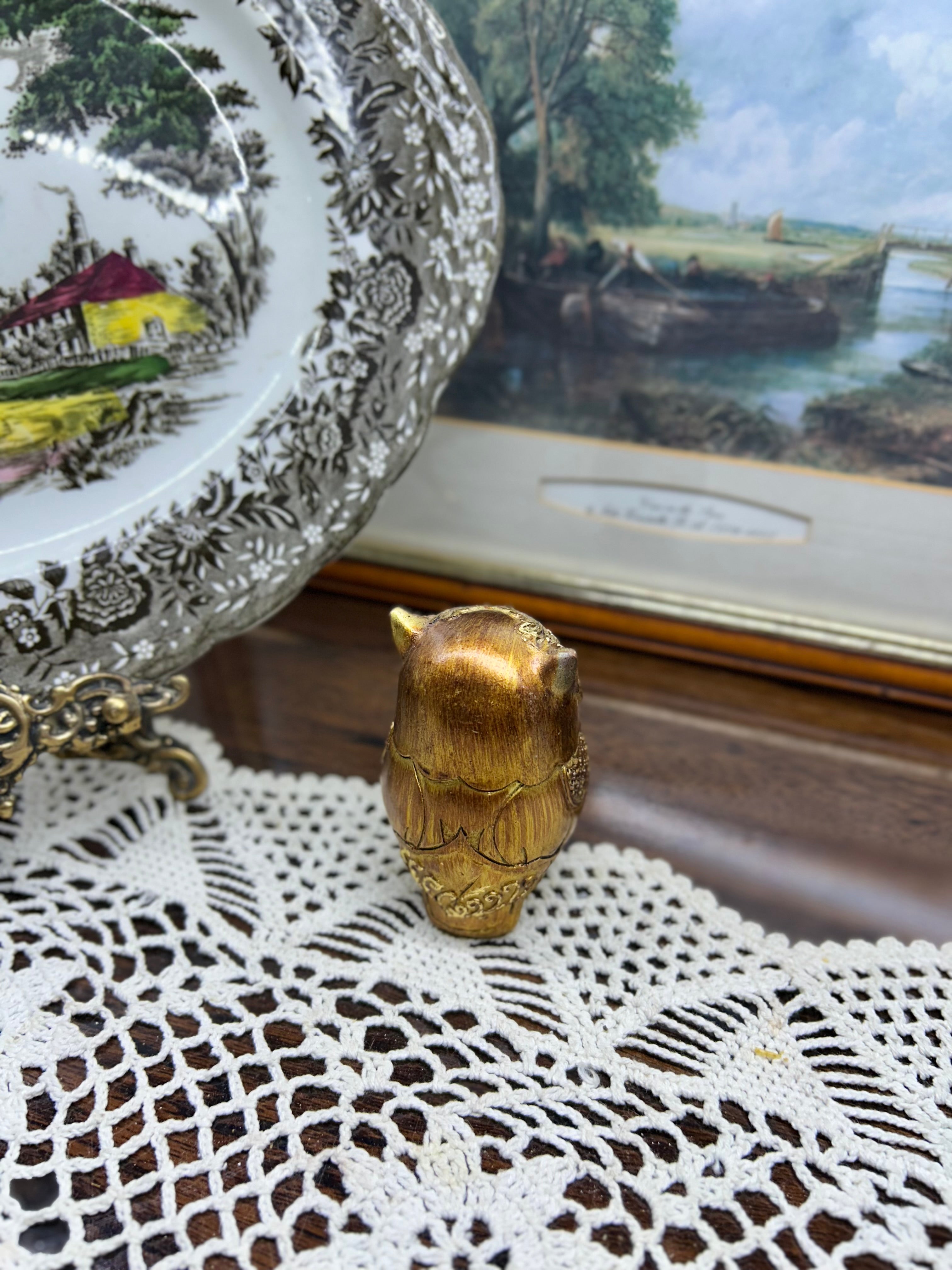 Decorative hand-painted gold owl figurine