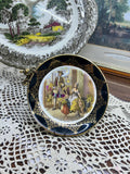 Vintage collector plate featuring a "Cries of London" scene, produced by Regency Bone China
